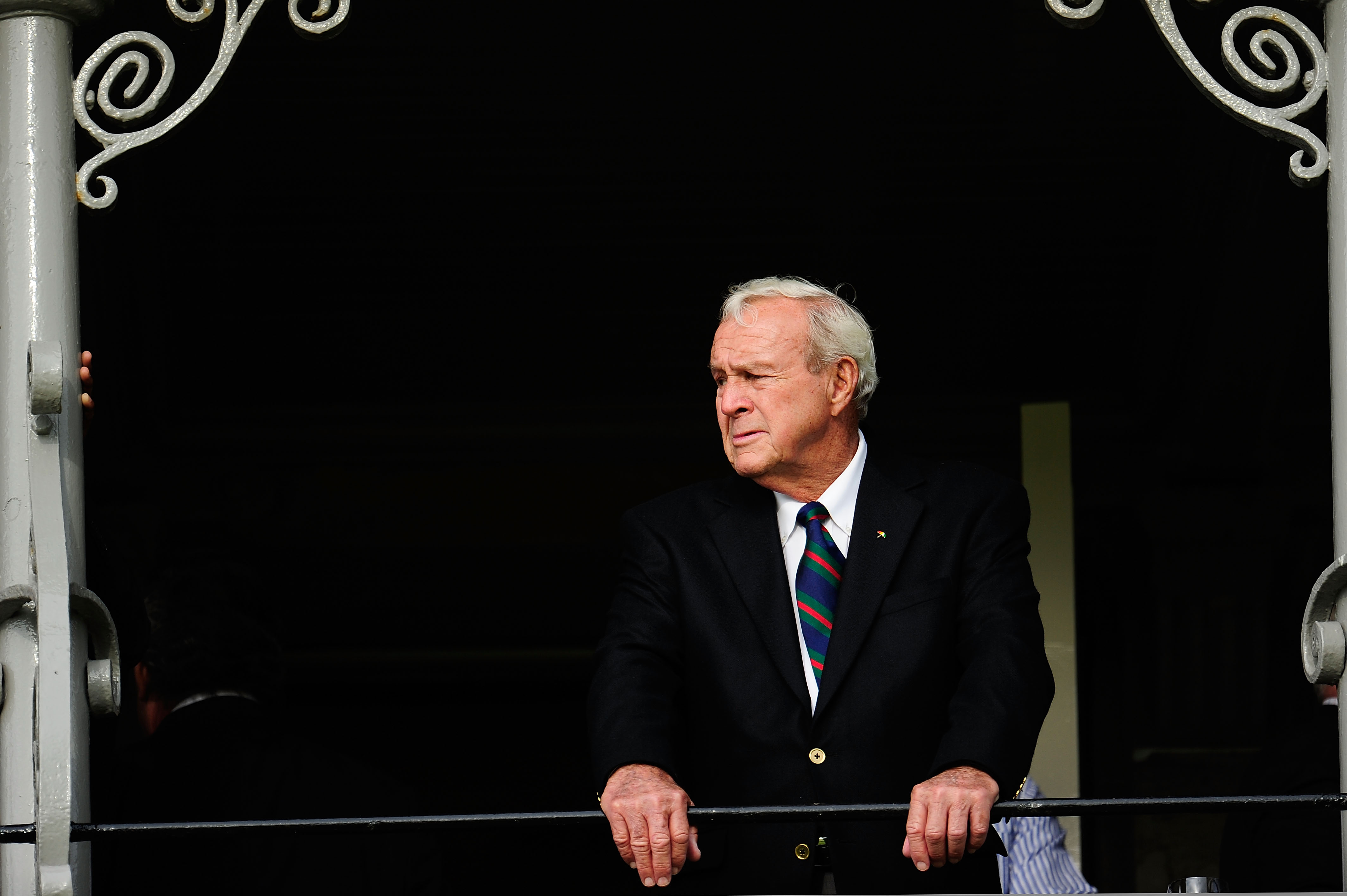 ST ANDREWS, SCOTLAND - JULY 13:  Arnold Palmer of the USA stands on the balcony before the past champions dinner before the 139th Open Championship on the Old Course, St Andrews on July 13, 2010 in St Andrews, Scotland.  (Photo by Stuart Franklin/Getty Im