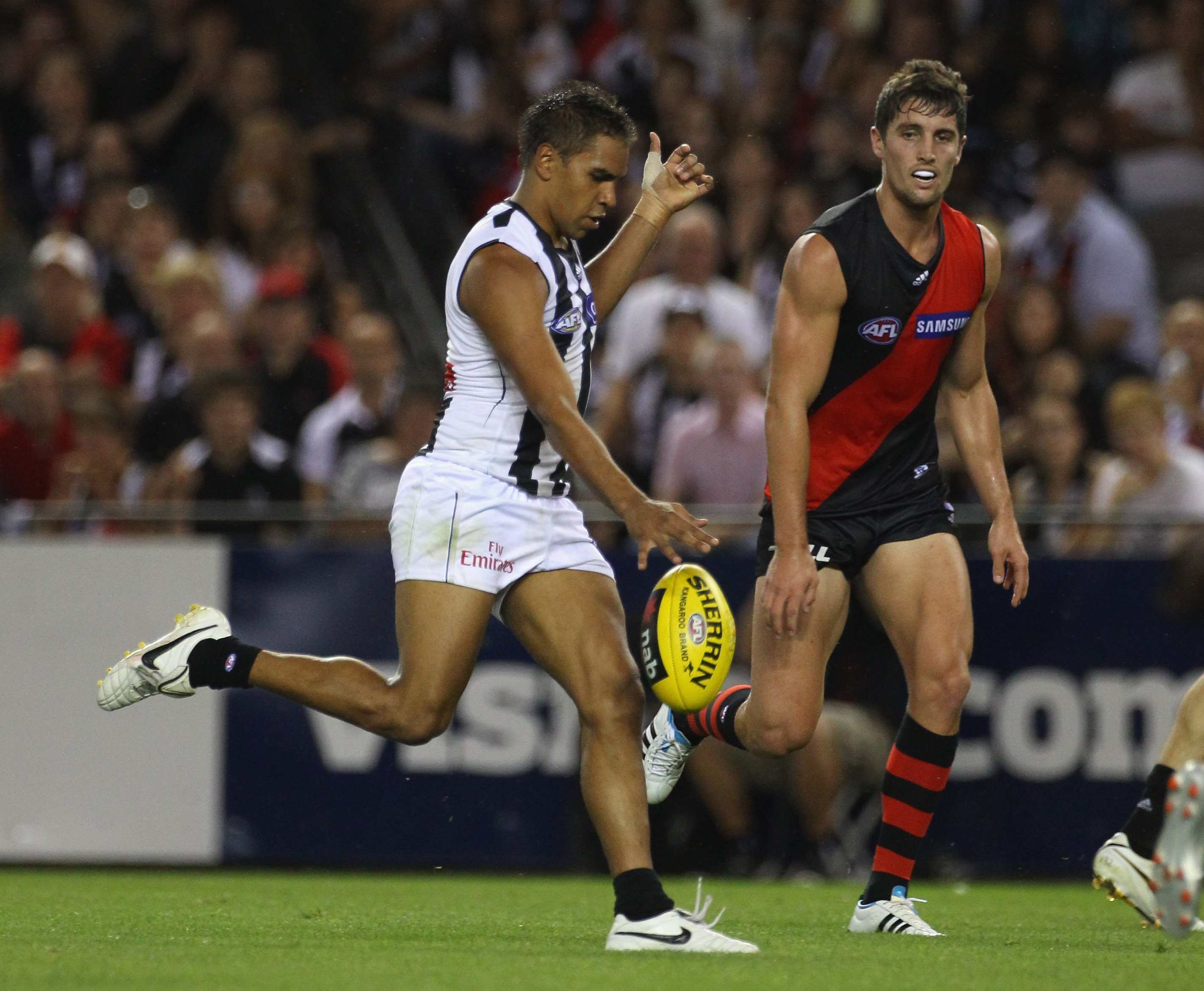 MELBOURNE, AUSTRALIA - MARCH 11: Andrew Krakouer of the Magpies kicks for goal during the NAB Cup AFL Grand Final match between the Essendong Bombers and the Collingwood Magpies at Etihad Stadium on March 11, 2011 in Melbourne, Australia. (Photo by Rober