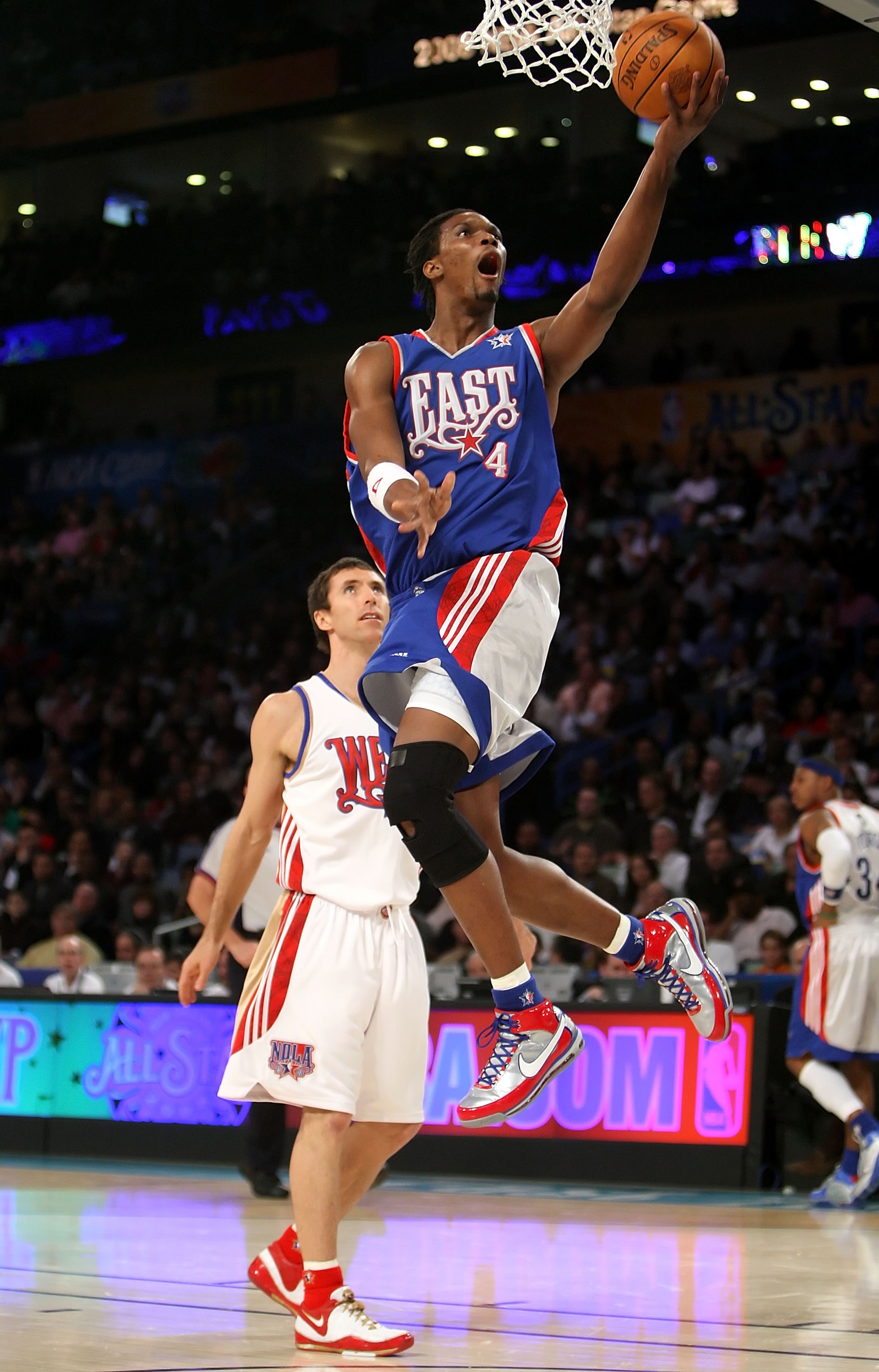 NEW ORLEANS - FEBRUARY 17:  Chris Bosh #4 of the Eastern Conference lays the ball up over Steve Nash #13 of the Western Conference during the 57th NBA All-Star Game, part of 2008 NBA All-Star Weekend at the New Orleans Arena on February 17, 2008 in New Or