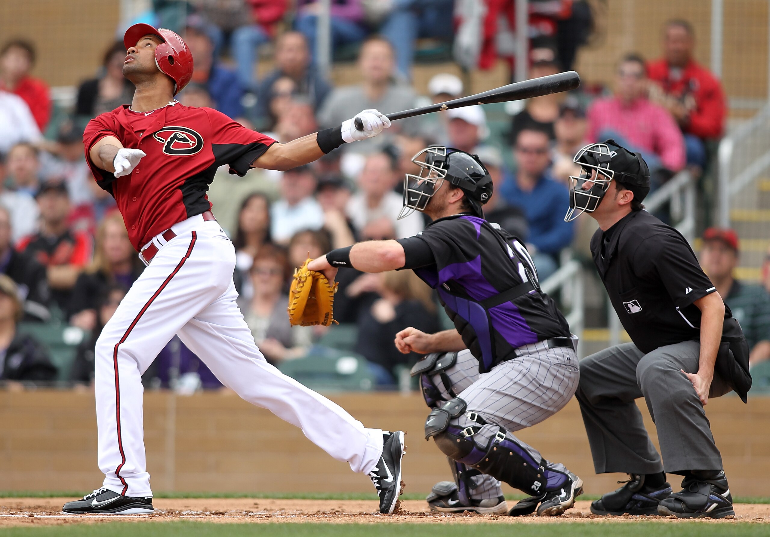 SCOTTSDALE, AZ - FEBRUARY 26:  Chris Young #24 of the Arizona Diamondbacks swings his bat against the Colorado Rockies at Salt River Fields on February 26, 2011 in Scottsdale, Arizona..  (Photo by Jonathan Ferrey/Getty Images)