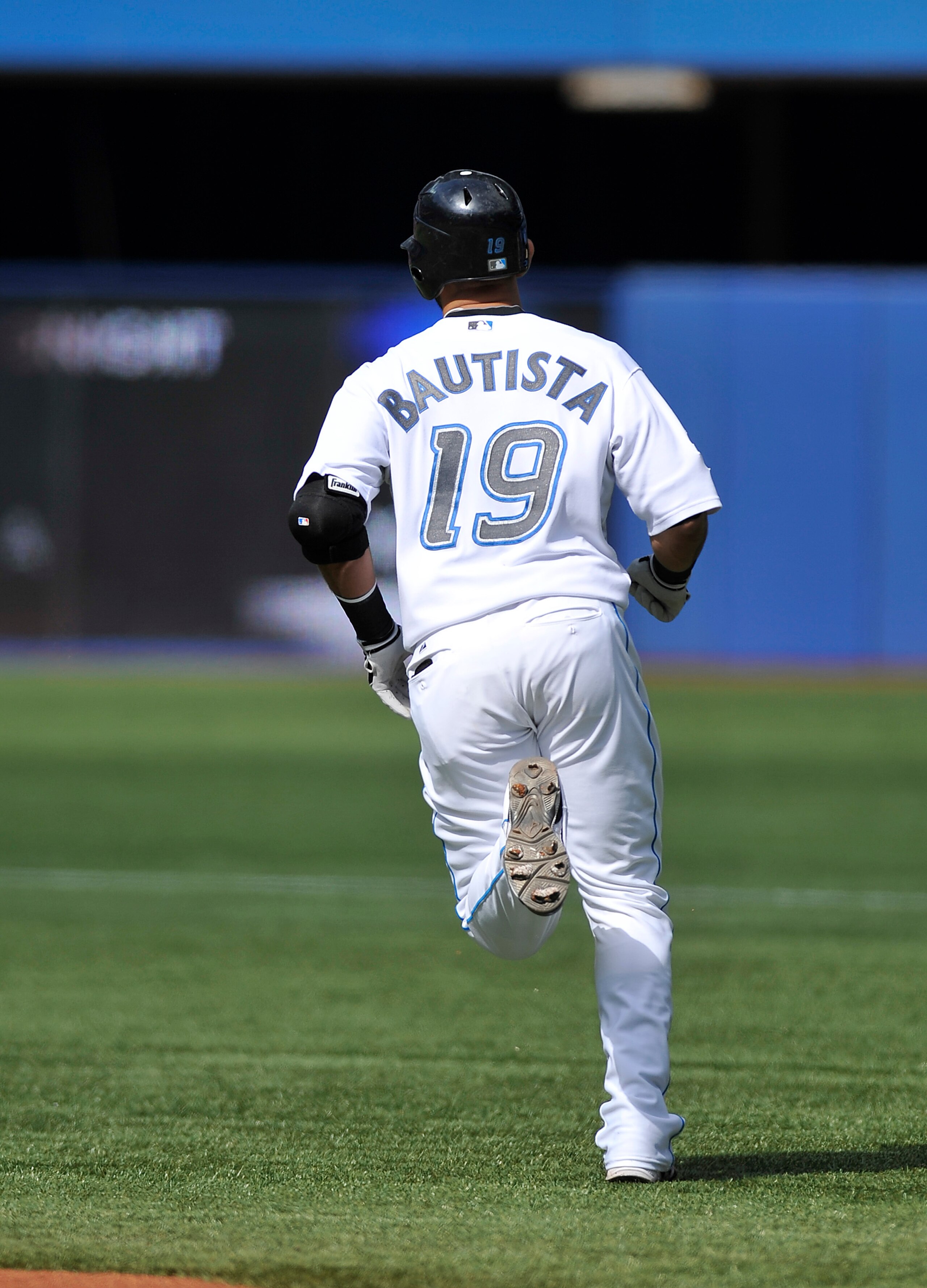 TORONTO - SEPTEMBER 23:   Jose Bautista #19 of the Toronto Blue Jays jogs around the bases after hitting his 50th home run of the season during the game against the Seattle Mariners on September 23, 2010 at Rogers Centre in Toronto, Ontario, Canada. The B