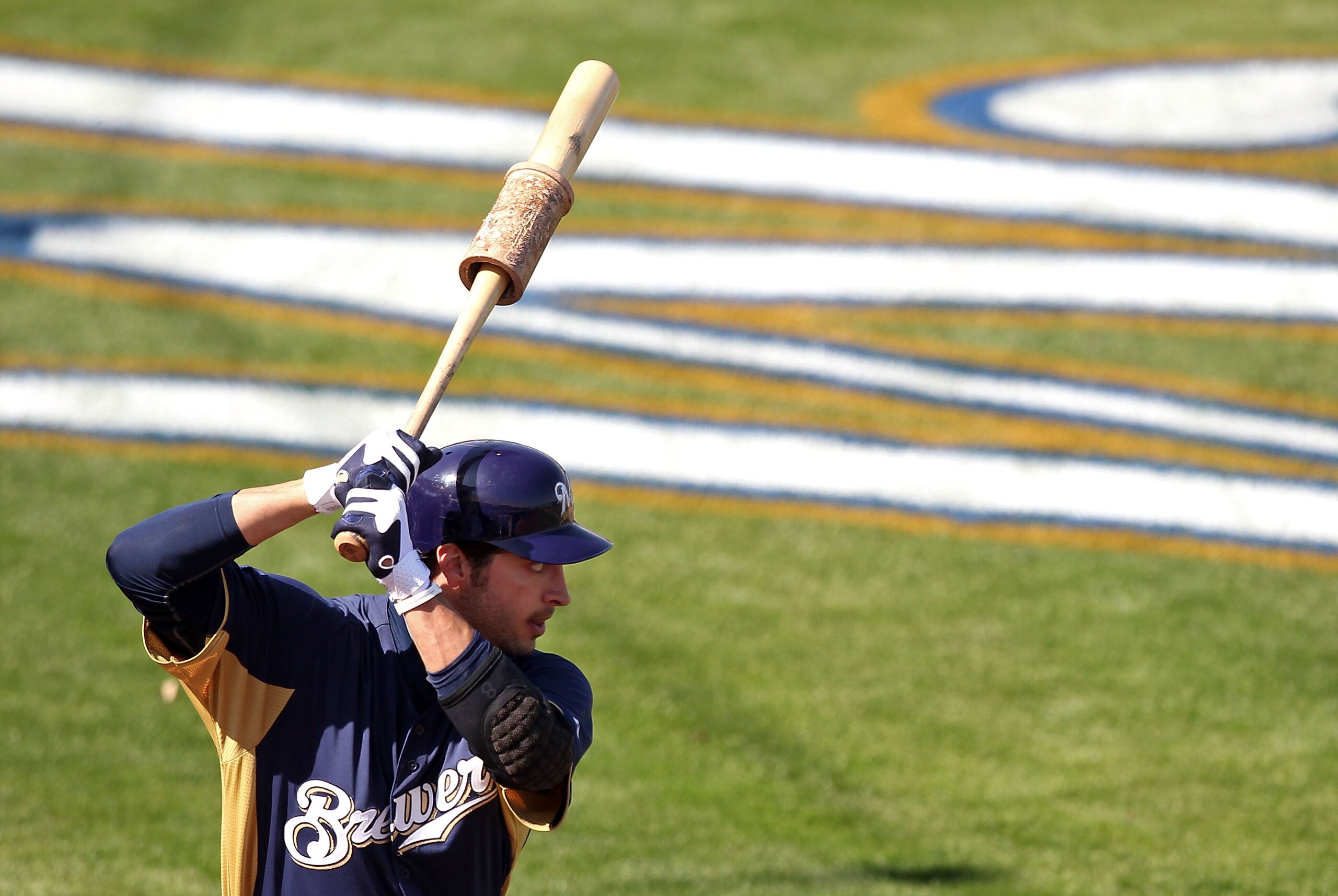 PHOENIX, AZ - MARCH 03:  Ryan Braun #8 of the Milwaukee Brewers warms up on deck during the spring training game against the Oakland Athletics at Maryvale Baseball Park on March 3, 2011 in Phoenix, Arizona.  (Photo by Christian Petersen/Getty Images)