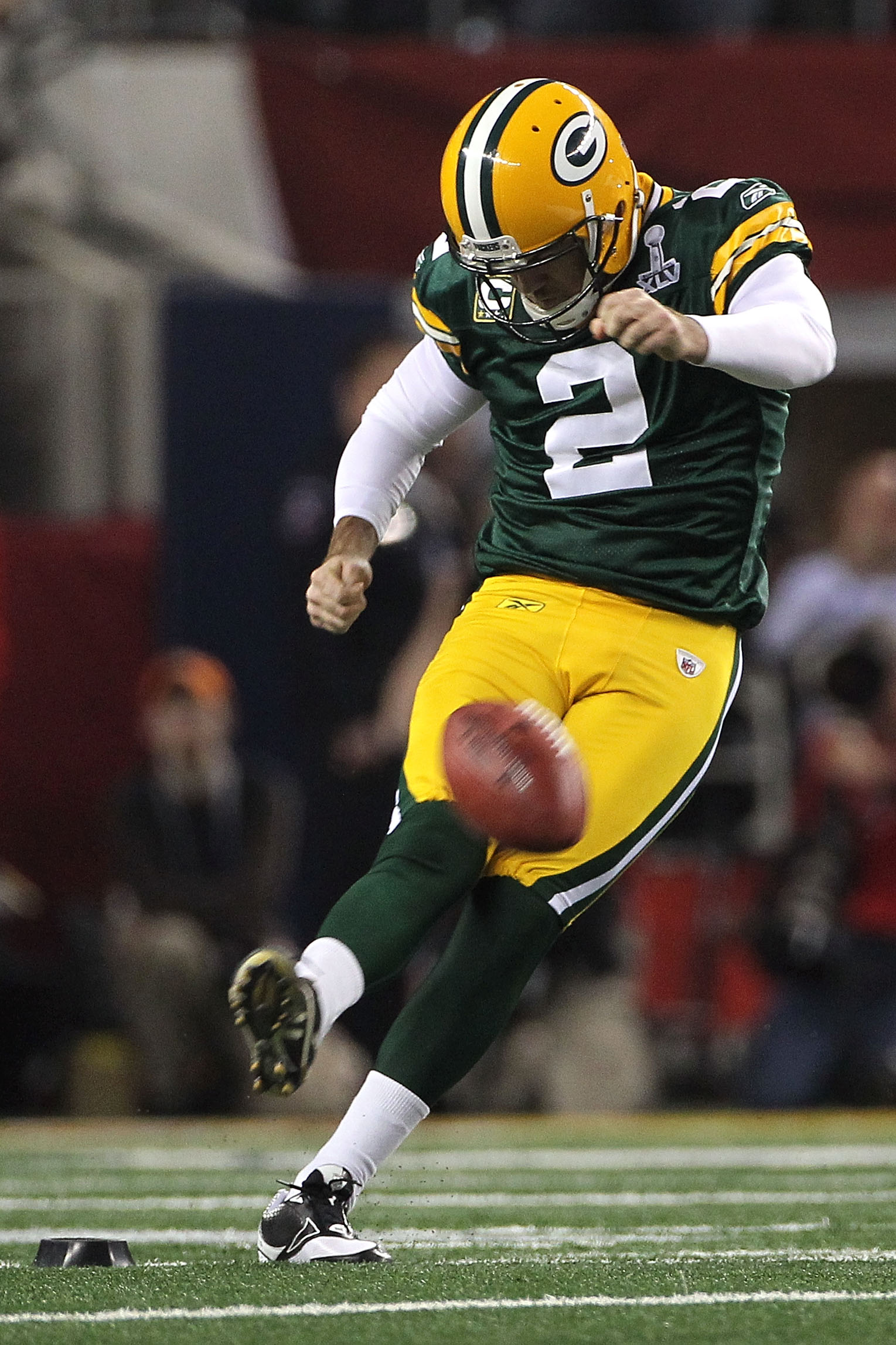 ARLINGTON, TX - FEBRUARY 06:  Mason Crosby #2 of the Green Bay Packers kicks off to start Super Bowl XLV against the Pittsburgh Steelers at Cowboys Stadium on February 6, 2011 in Arlington, Texas.  (Photo by Doug Pensinger/Getty Images)
