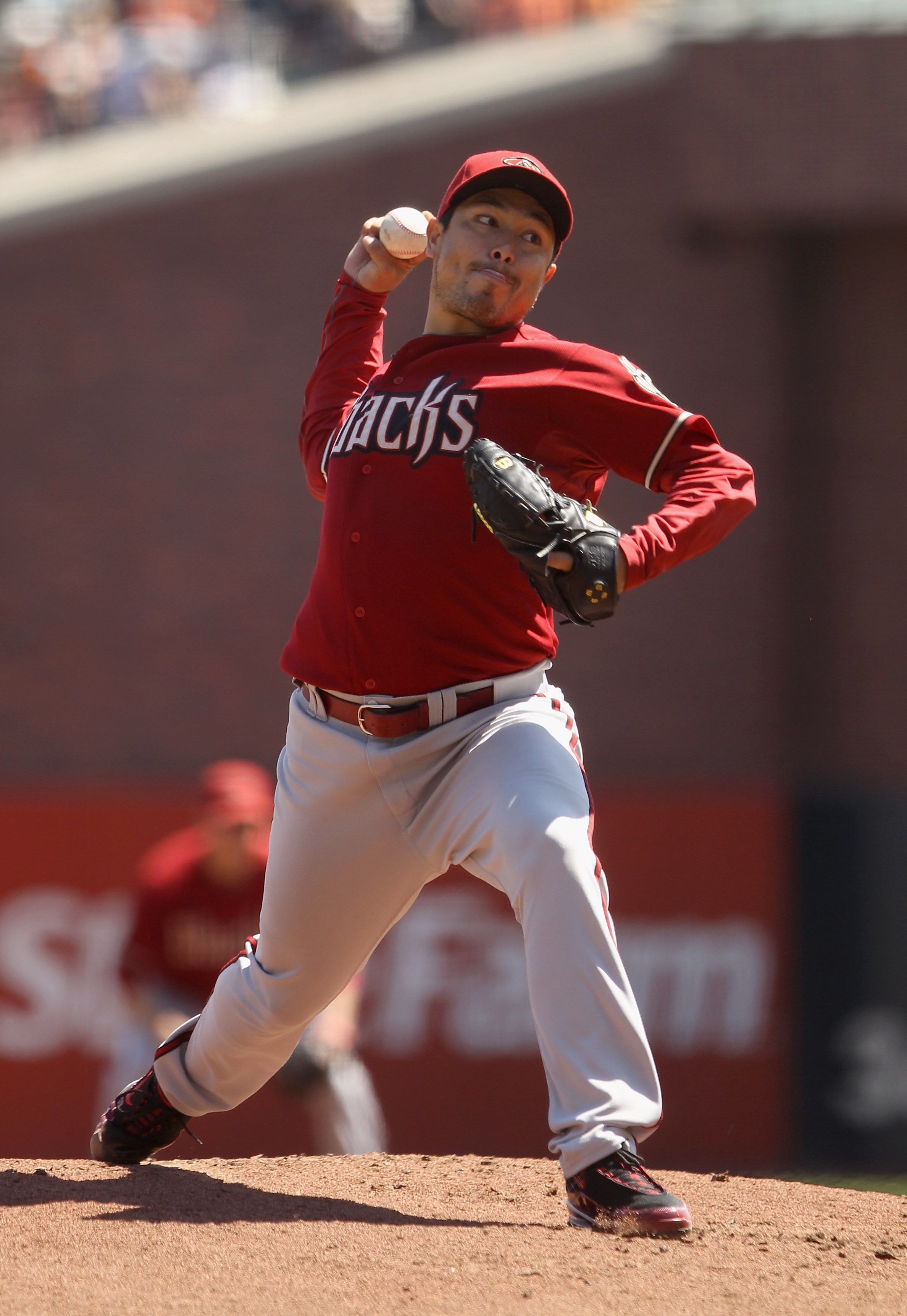 SAN FRANCISCO - AUGUST 29:  Rodrigo Lopez #13 of the Arizona Diamondbacks pitches against the San Francisco Giants at AT&T Park on August 29, 2010 in San Francisco, California.  (Photo by Ezra Shaw/Getty Images)