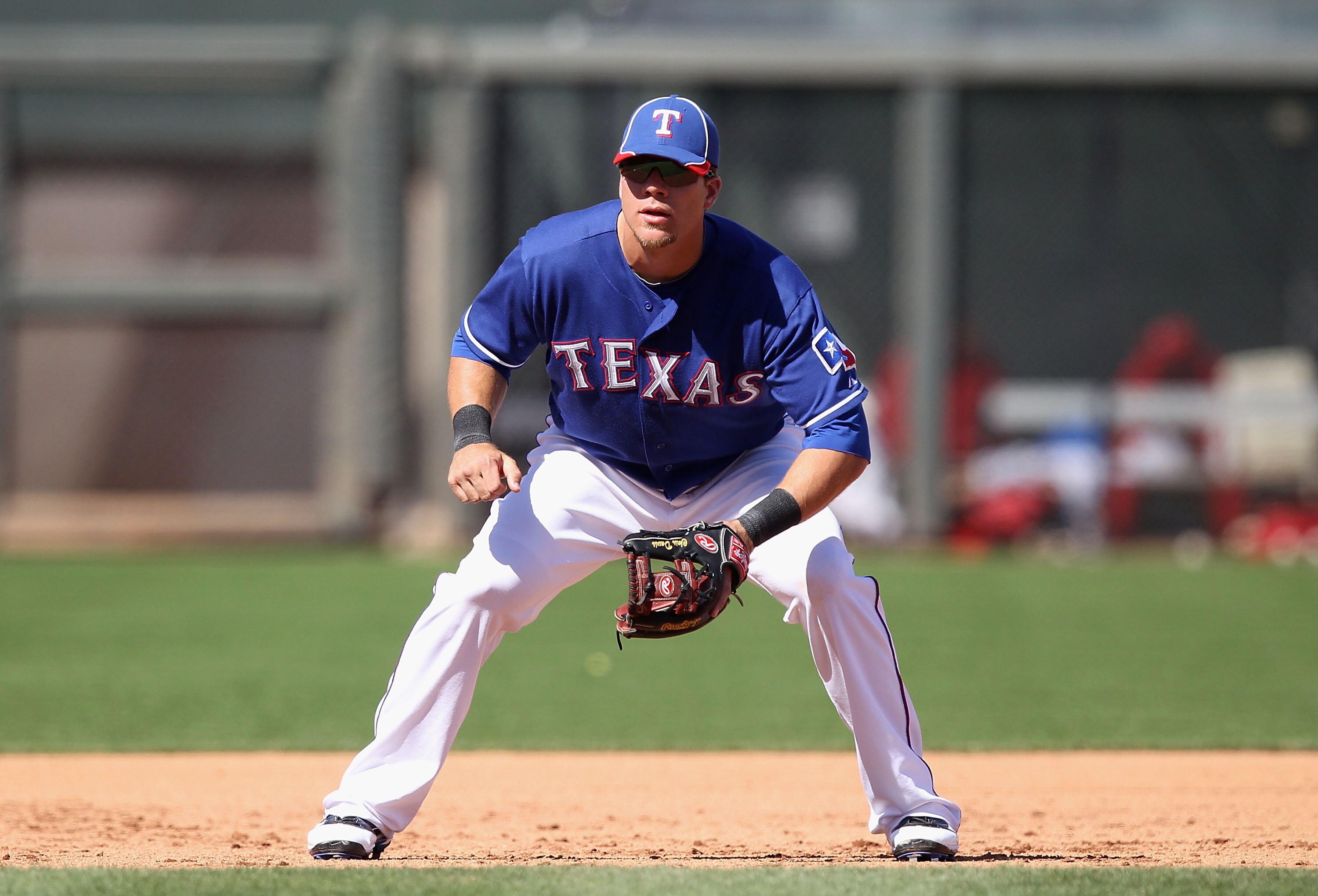 SURPRISE, AZ - MARCH 11:  Infielder Chris Davis #19 of the Texas Rangers during the spring training game against the Cincinnati Reds at Surprise Stadium on March 11, 2011 in Surprise, Arizona.  (Photo by Christian Petersen/Getty Images)