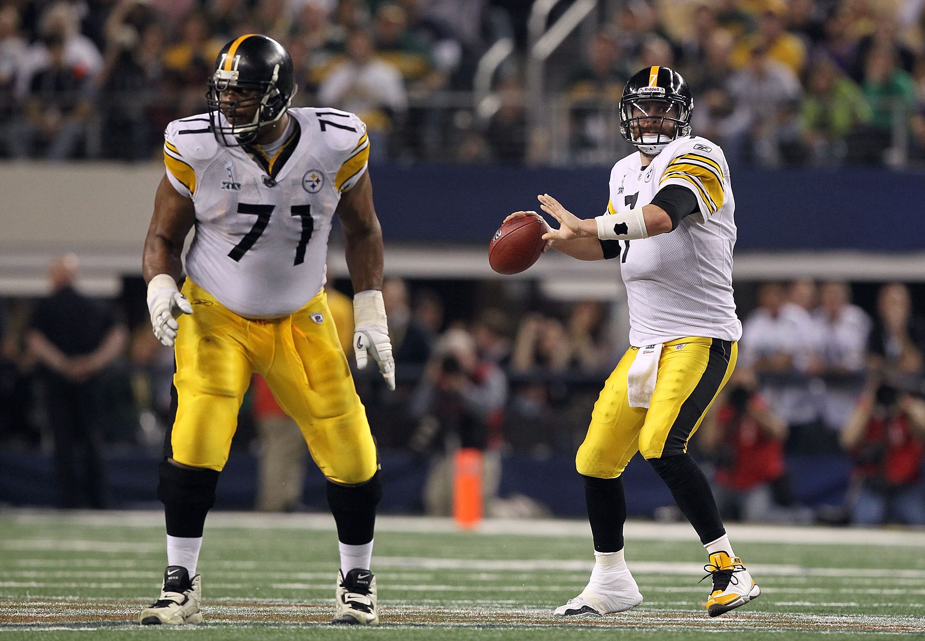 ARLINGTON, TX - FEBRUARY 06:  Quarterback Ben Roethlisberger #7 of the Pittsburgh Steelers throws a pass as Flozell Adams #71 blocks against the Green Bay Packers during Super Bowl XLV at Cowboys Stadium on February 6, 2011 in Arlington, Texas. Packers wo