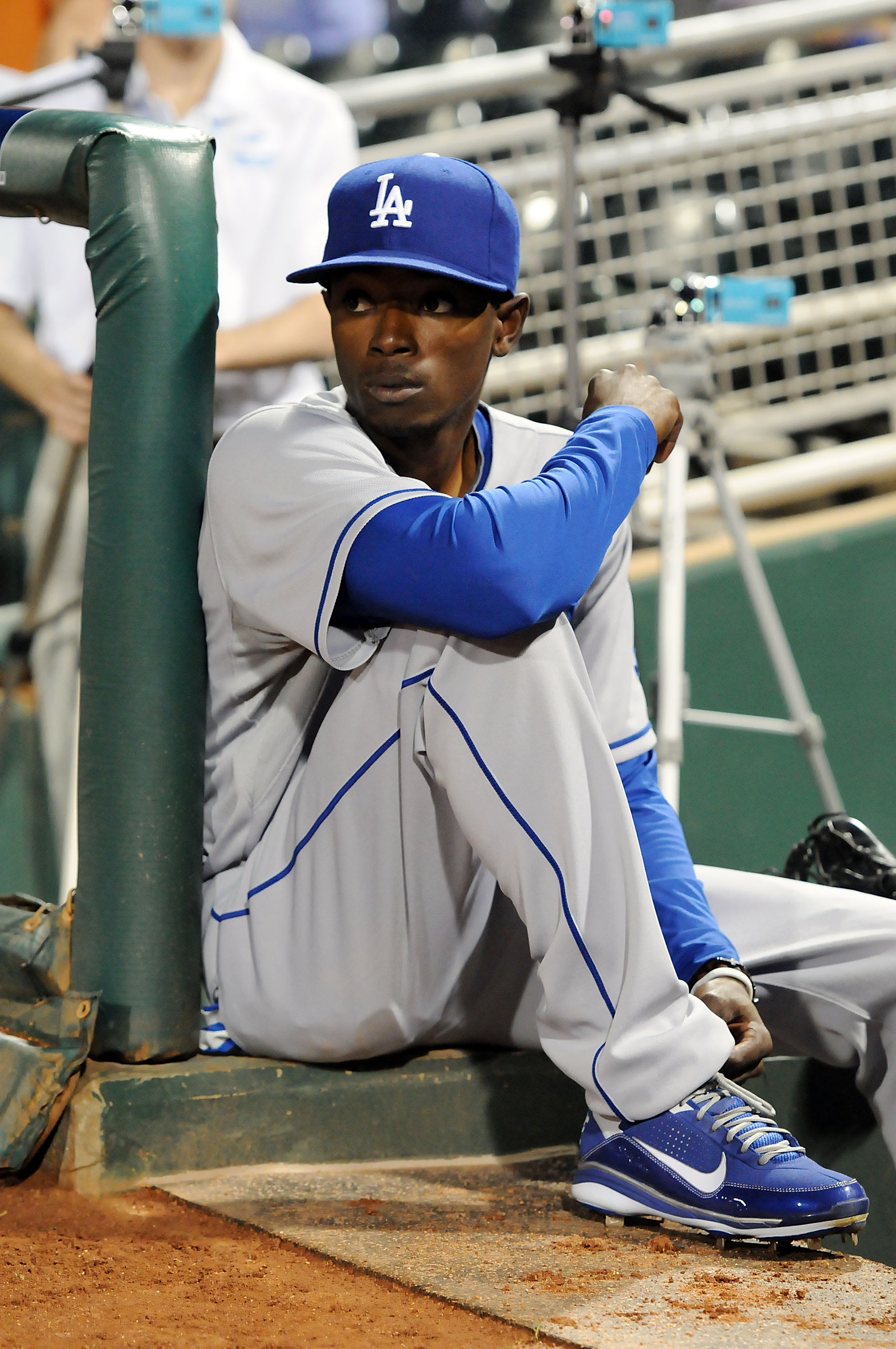 GOODYEAR, AZ - MARCH 03:  Dee Gordon #70 of the Los Angeles Dodgers watches his team take on the Cincinnati Reds from the bench at Goodyear Ballpark on March 3, 2011 in Goodyear, Arizona.  (Photo by Norm Hall/Getty Images)