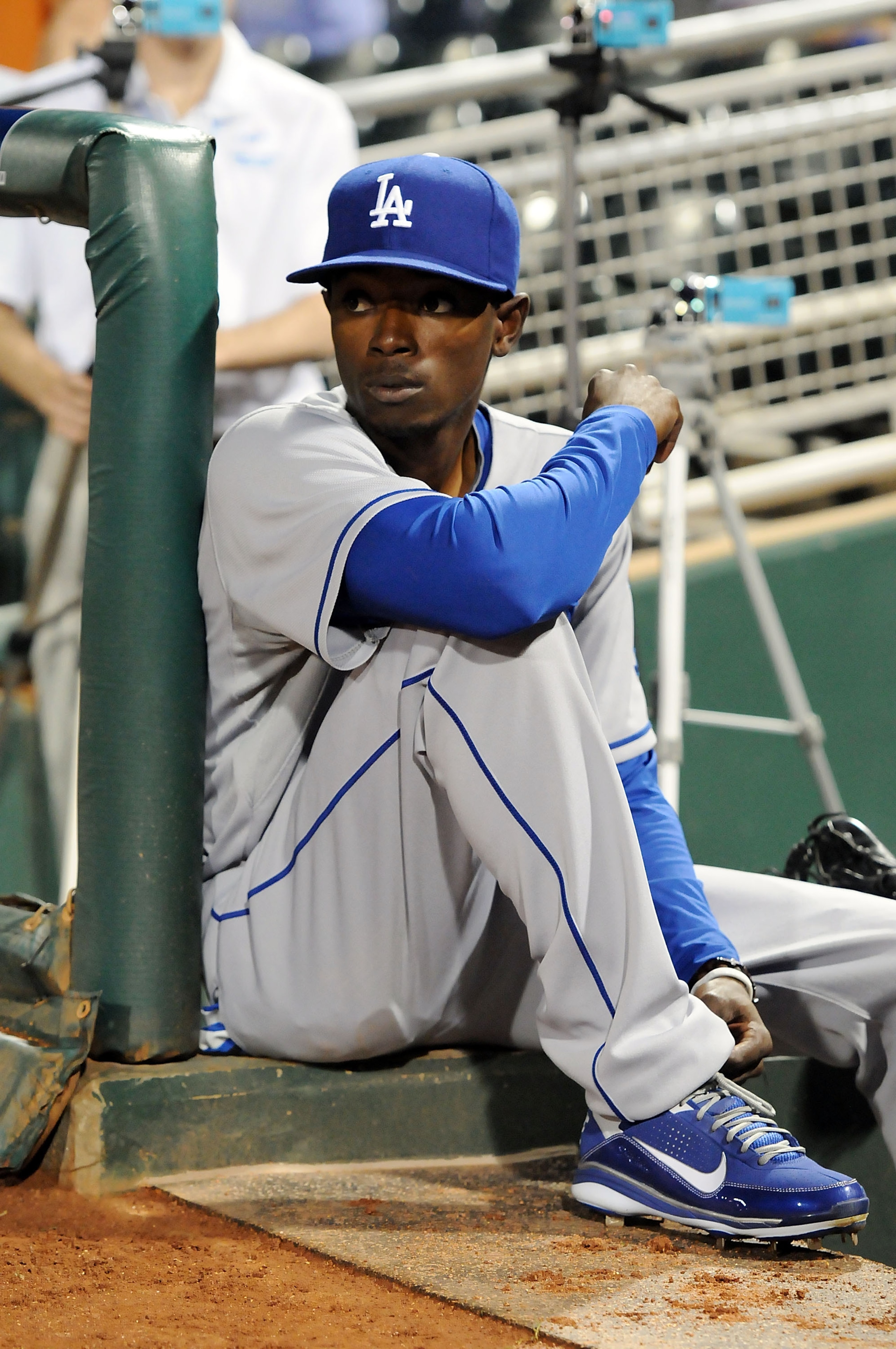 GOODYEAR, AZ - MARCH 03:  Dee Gordon #70 of the Los Angeles Dodgers watches his team take on the Cincinnati Reds from the bench at Goodyear Ballpark on March 3, 2011 in Goodyear, Arizona.  (Photo by Norm Hall/Getty Images)