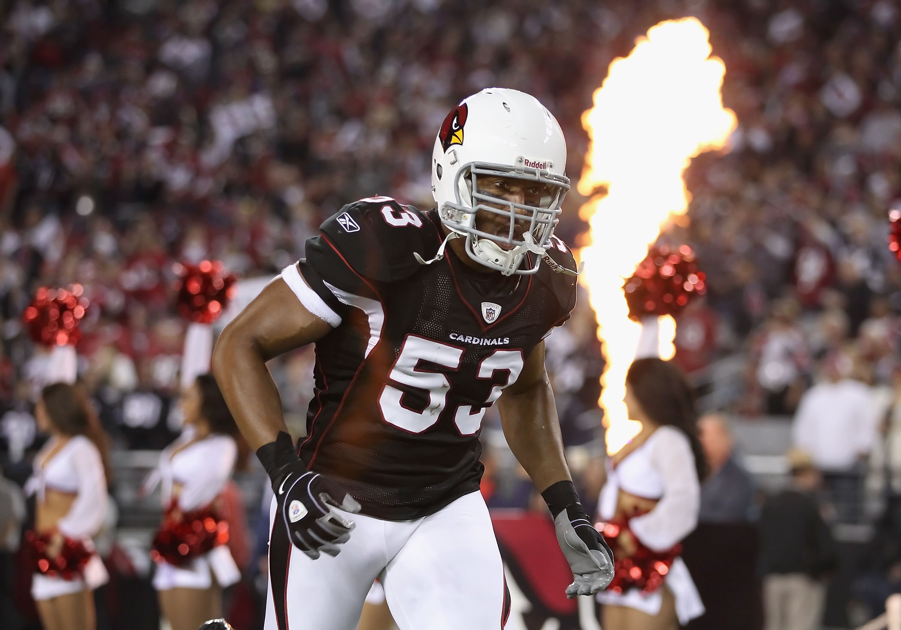GLENDALE, AZ - NOVEMBER 29:  Linebacker Clark Haggans #53 of the Arizona Cardinals is introduced before the NFL game against the San Francisco 49ers at the University of Phoenix Stadium on November 29, 2010 in Glendale, Arizona.  The 49ers defeated the Ca