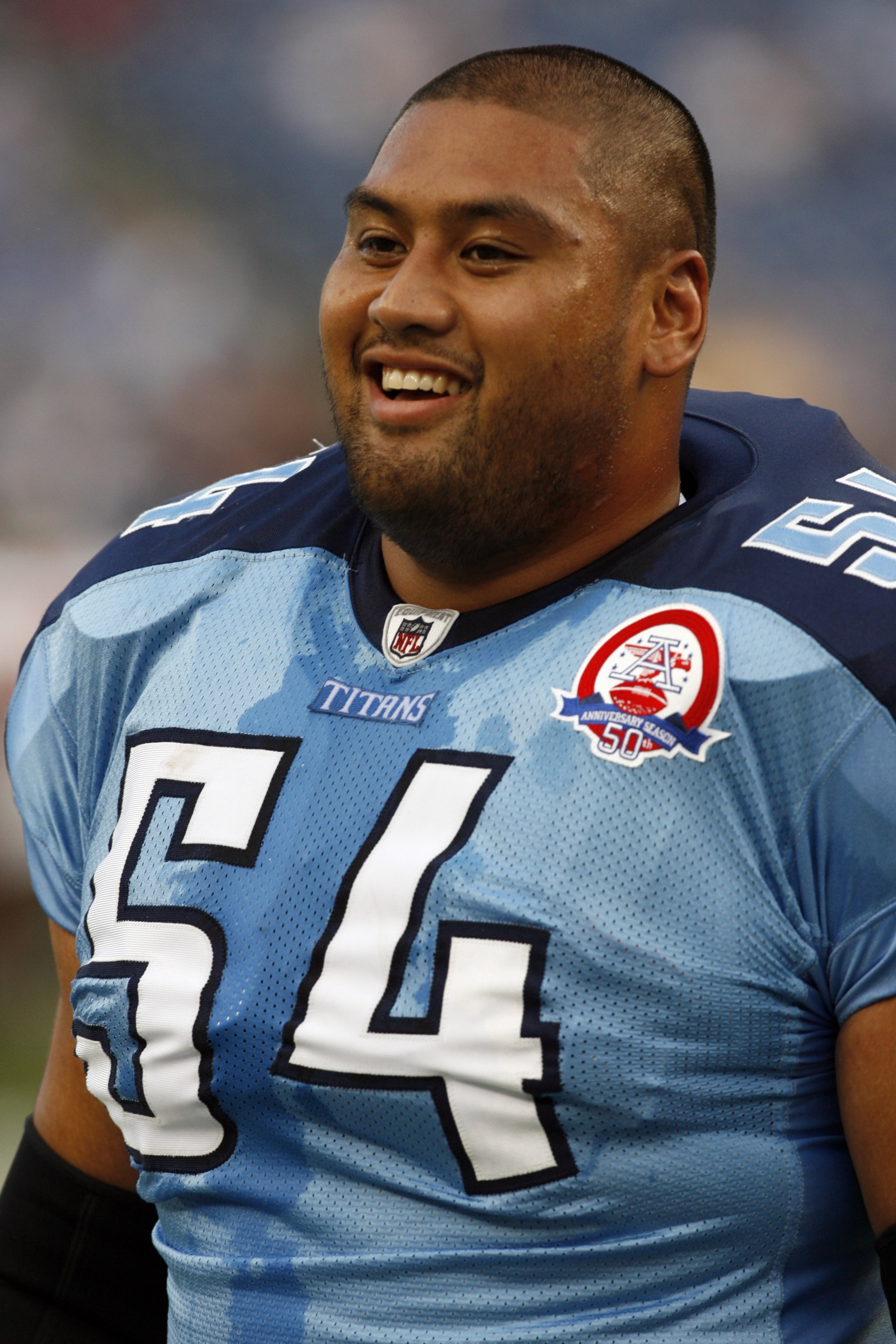 NASHVILLE, TN - AUGUST 15: Eugene Amano #54 of the Tennessee Titans laughs during pregame warmups against the Tampa Bay Buccaneers during a preseason NFL game at LP Field on August 15, 2009 in Nashville, Tennessee. The Titans beat the Buccaneers 27-20. (P