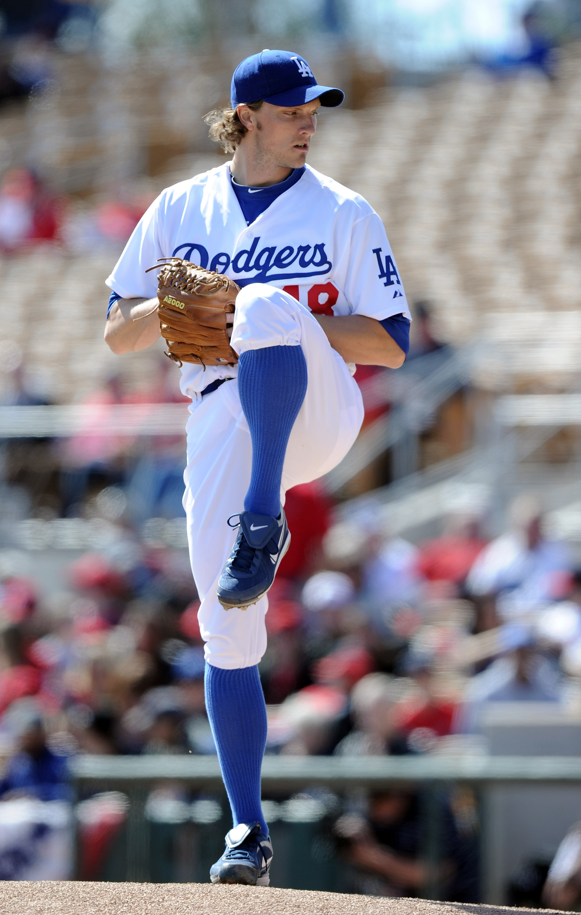 PHOENIX, AZ - FEBRUARY 27:  John Ely #48 of the Los Angeles Dodgers pitches against the  Los Angeles Angels in the first inning during spring training at Camelback Ranch on February 27, 2011 in Phoenix, Arizona.  (Photo by Harry How/Getty Images)