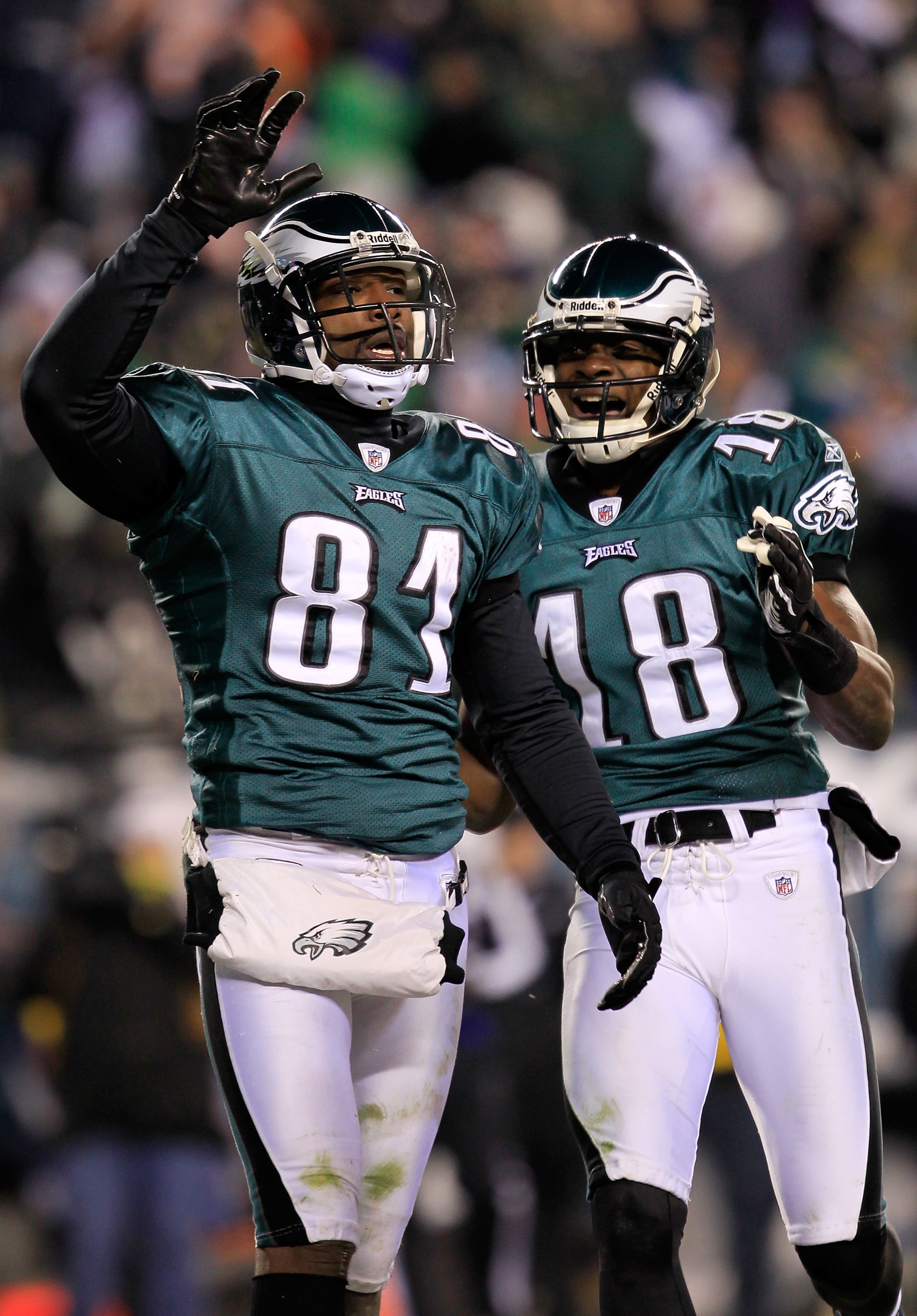 PHILADELPHIA, PA - JANUARY 09:  Jason Avant #81 and Jeremy Maclin #18 of the Philadelphia Eagles celebrates Avant's third quarter touchdown against the Green Bay Packers during the 2011 NFC wild card playoff game at Lincoln Financial Field on January 9, 2