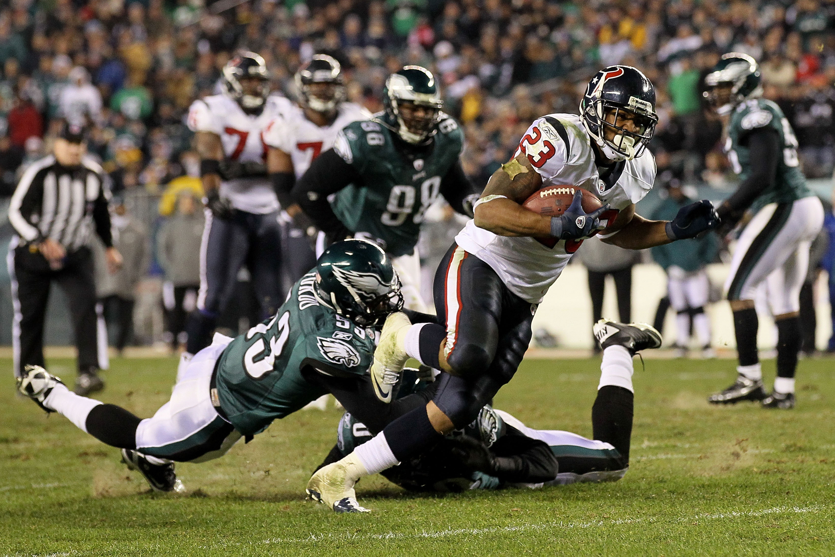 PHILADELPHIA, PA - DECEMBER 02:  Arian Foster #23 of the Houston Texans scores on a 14-yard touchdown reception in the third quarter against Nate Allen #29 of the Philadelphia Eagles at Lincoln Financial Field on December 2, 2010 in Philadelphia, Pennsylv