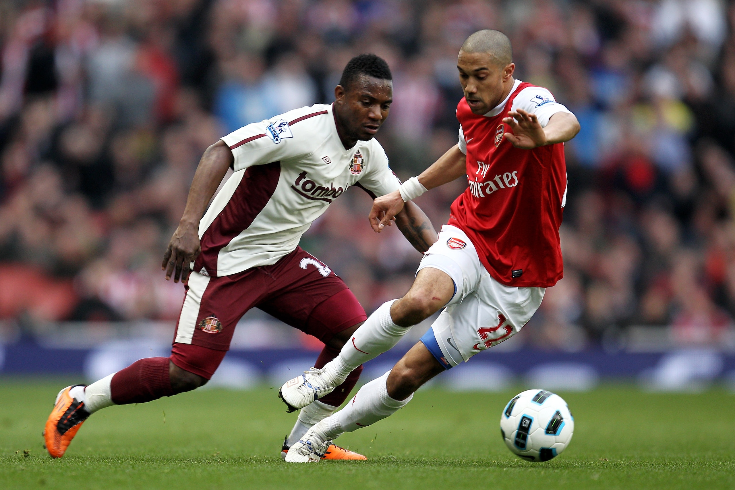 LONDON, ENGLAND - MARCH 05:  Stephane Sessegnon of Sunderland puts the pressure on Gael Clichy of Arsenal during the Barclays Premier League match between Arsenal and Sunderland at Emirates Stadium on March 5, 2011 in London, England.  (Photo by Paul Gilh