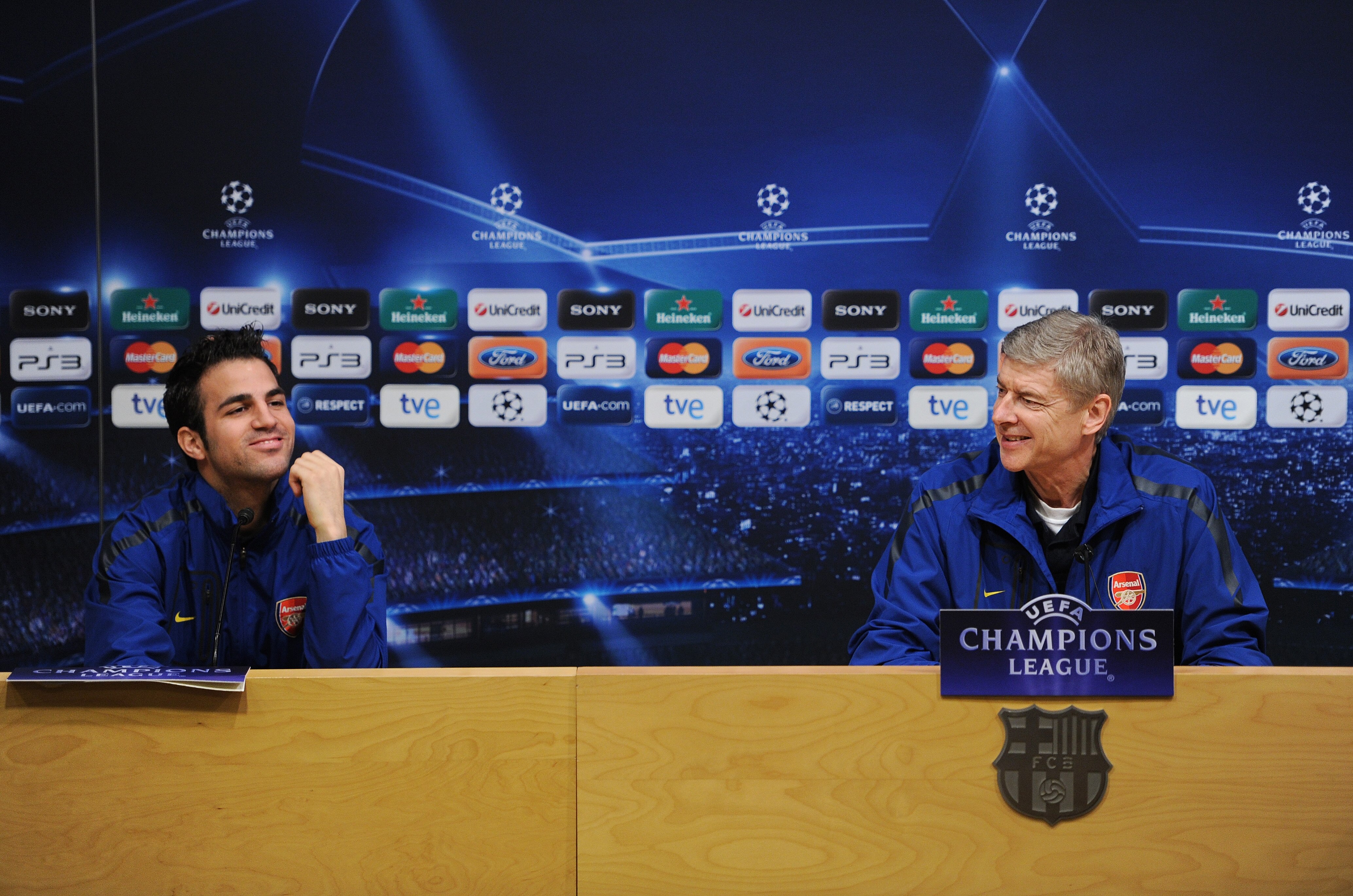 BARCELONA, SPAIN - MARCH 07:  Arsene Wenger (R), Manager of Arsenal sits besides player Cesc Fabregas during a press conference ahead of their UEFA Champions League round of 16 second leg match against Barcelona at the Camp Nou stadium on March 7, 2011 in