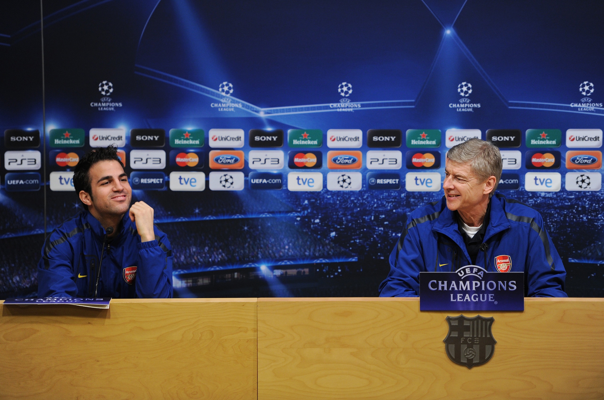 BARCELONA, SPAIN - MARCH 07:  Arsene Wenger (R), Manager of Arsenal sits besides player Cesc Fabregas during a press conference ahead of their UEFA Champions League round of 16 second leg match against Barcelona at the Camp Nou stadium on March 7, 2011 in