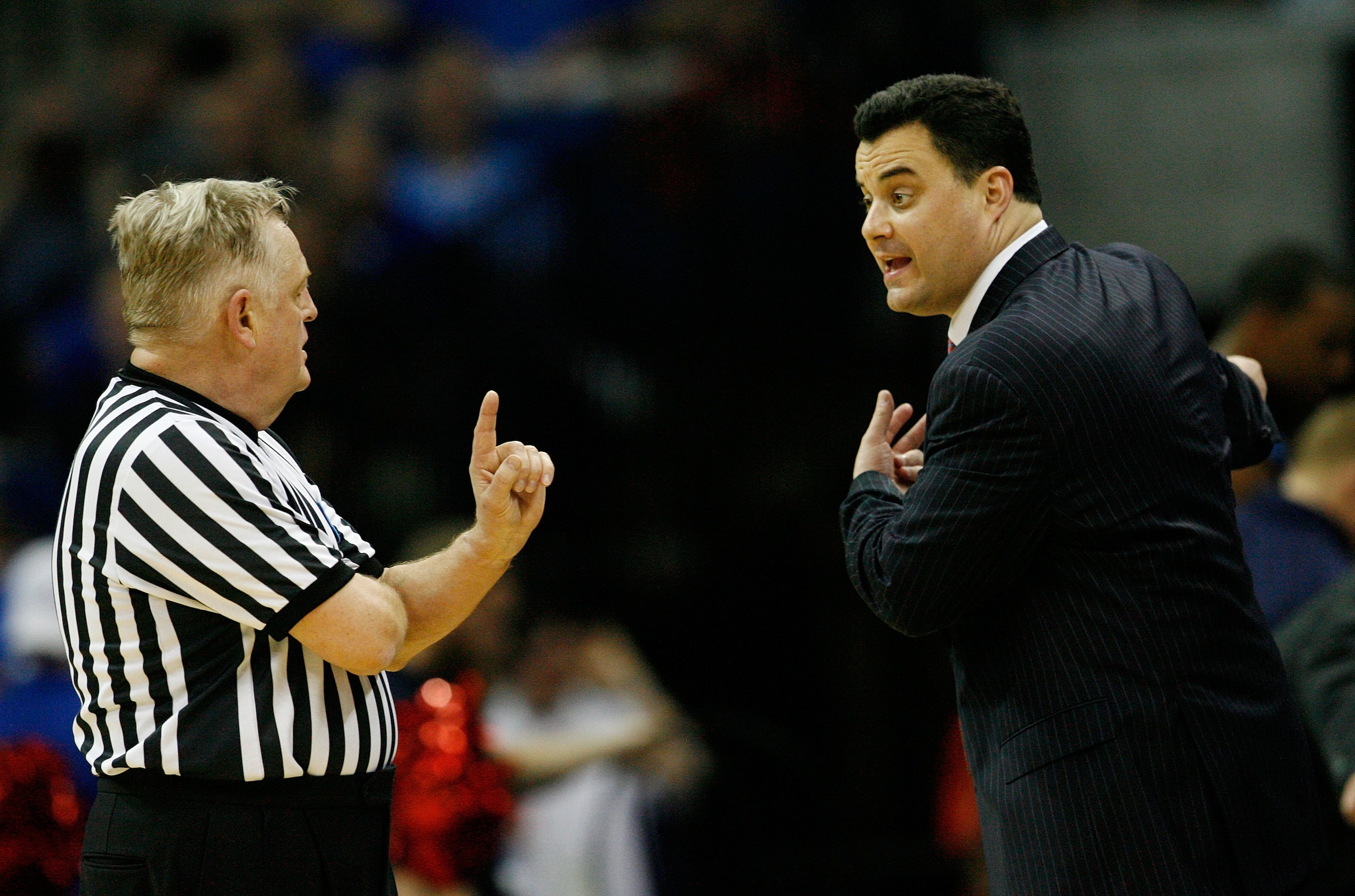 TULSA, OK - MARCH 20:  Head coach Sean Miller of the Arizona Wildcats argues with referee Jim Burr during the third round against the Texas Longhorns in the 2011 NCAA men's basketball tournament at BOK Center on March 20, 2011 in Tulsa, Oklahoma.  (Photo