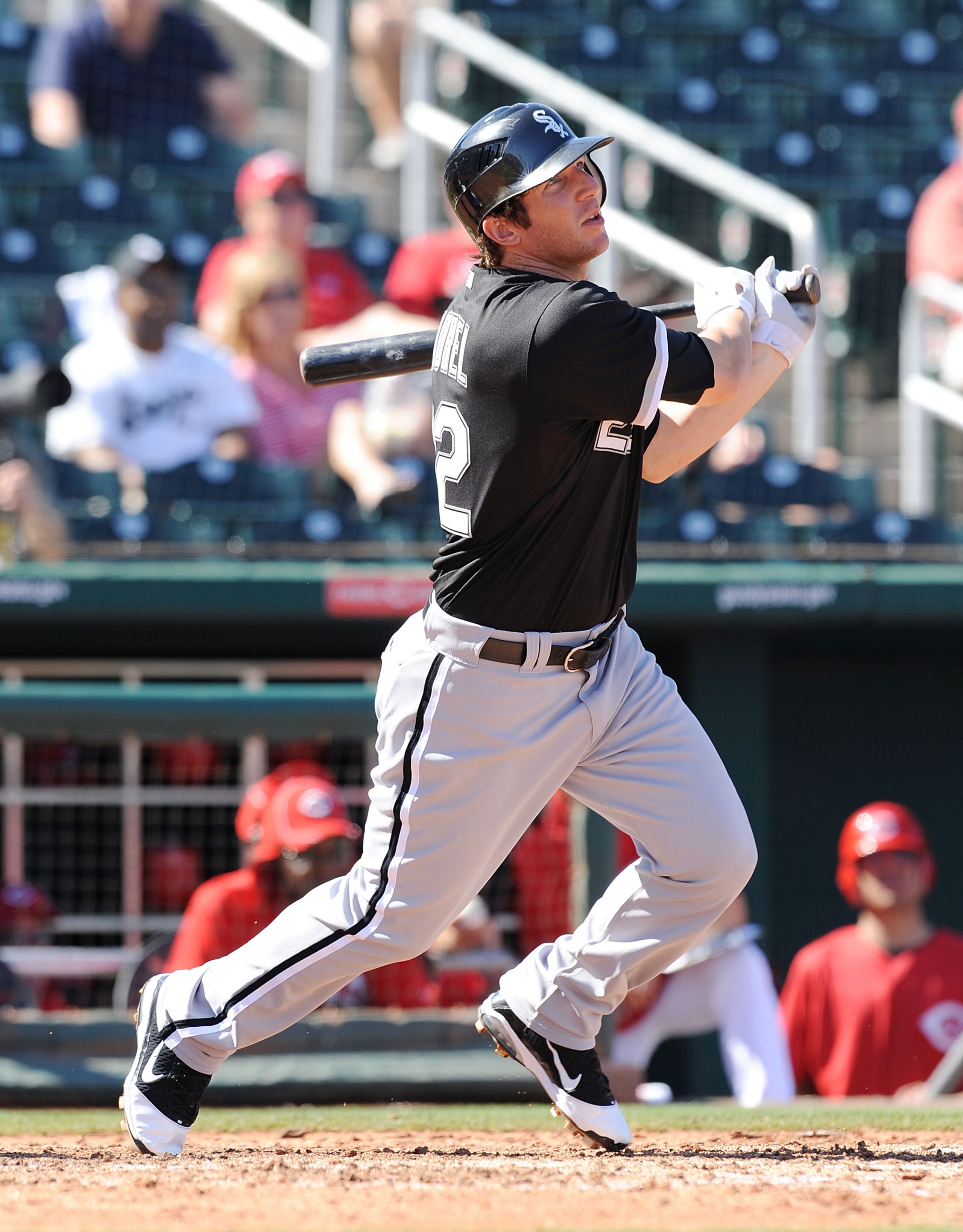 GOODYEAR, AZ - MARCH 02:  Brent Morel #22 of the Chicago White Sox watches the ball while running to first base against the Cincinnati Reds during a spring training game at Goodyear Ballpark on March 2, 2011 in Goodyear, Arizona.  (Photo by Norm Hall/Gett