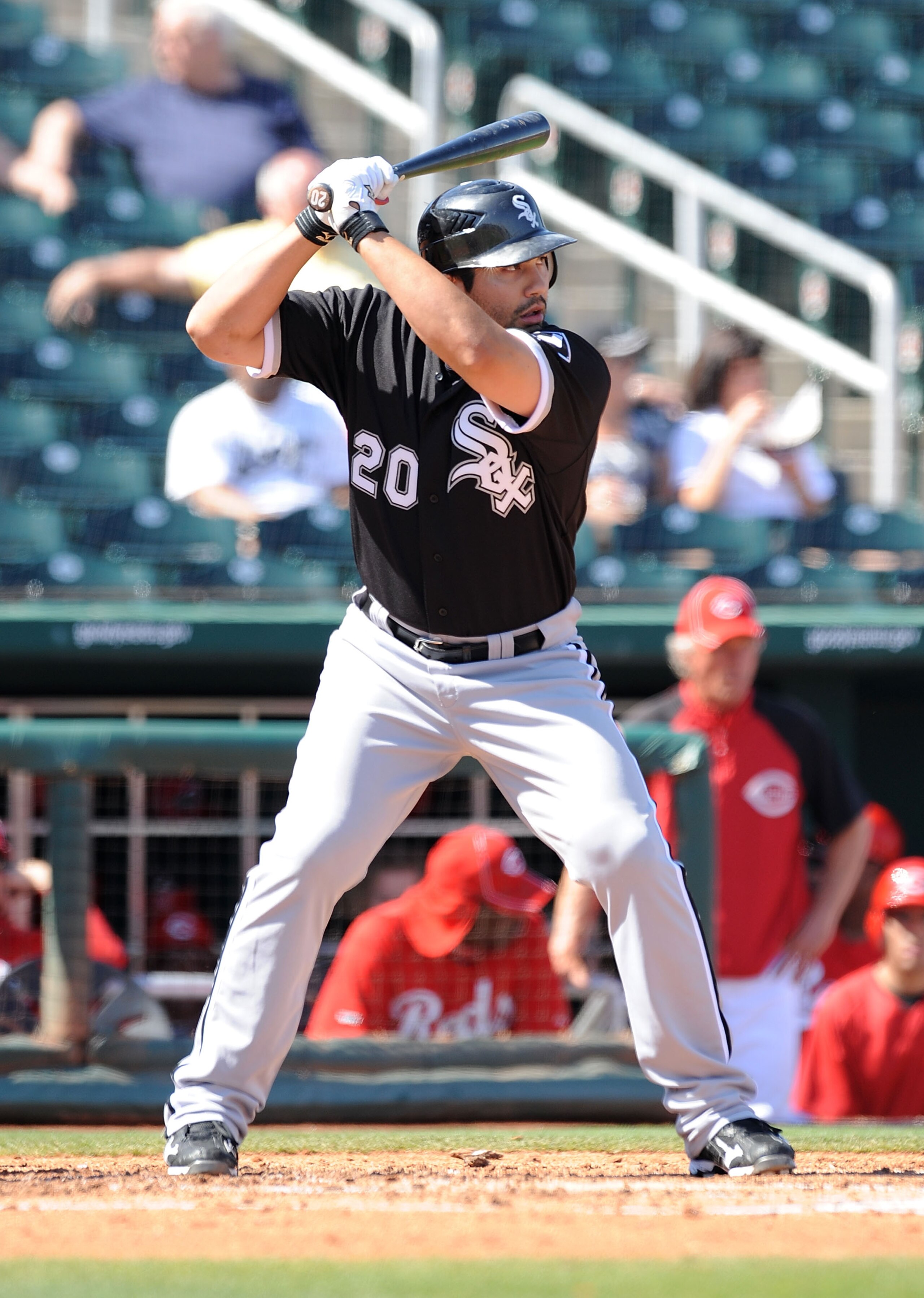 GOODYEAR, AZ - MARCH 02:  Carlos Quentin #20 of the Chicago White Sox stands in the batters box against the Cincinnati Reds during a spring training game at Goodyear Ballpark on March 2, 2011 in Goodyear, Arizona.  (Photo by Norm Hall/Getty Images)