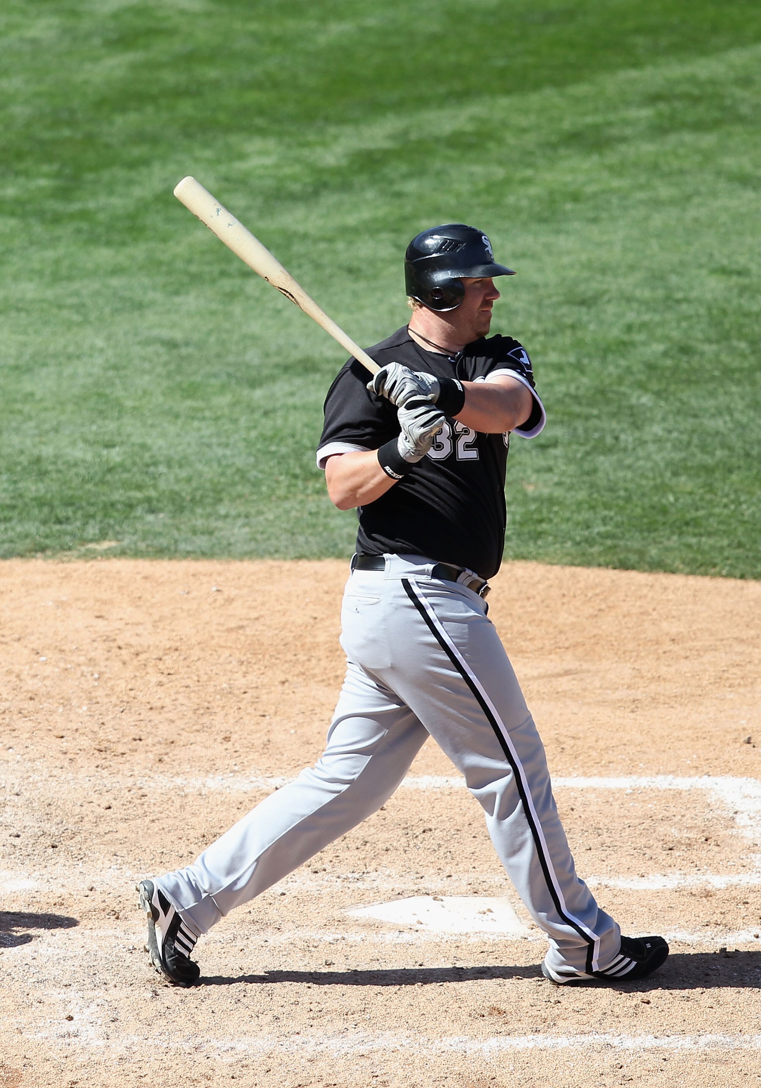 TUCSON, AZ - MARCH 07:  Adam Dunn #32 of the Chicago White Sox bats against the Arizona Diamondbacks during the spring training game at Kino Veterans Memorial Stadium on March 7, 2011 in Tucson, Arizona.  (Photo by Christian Petersen/Getty Images)