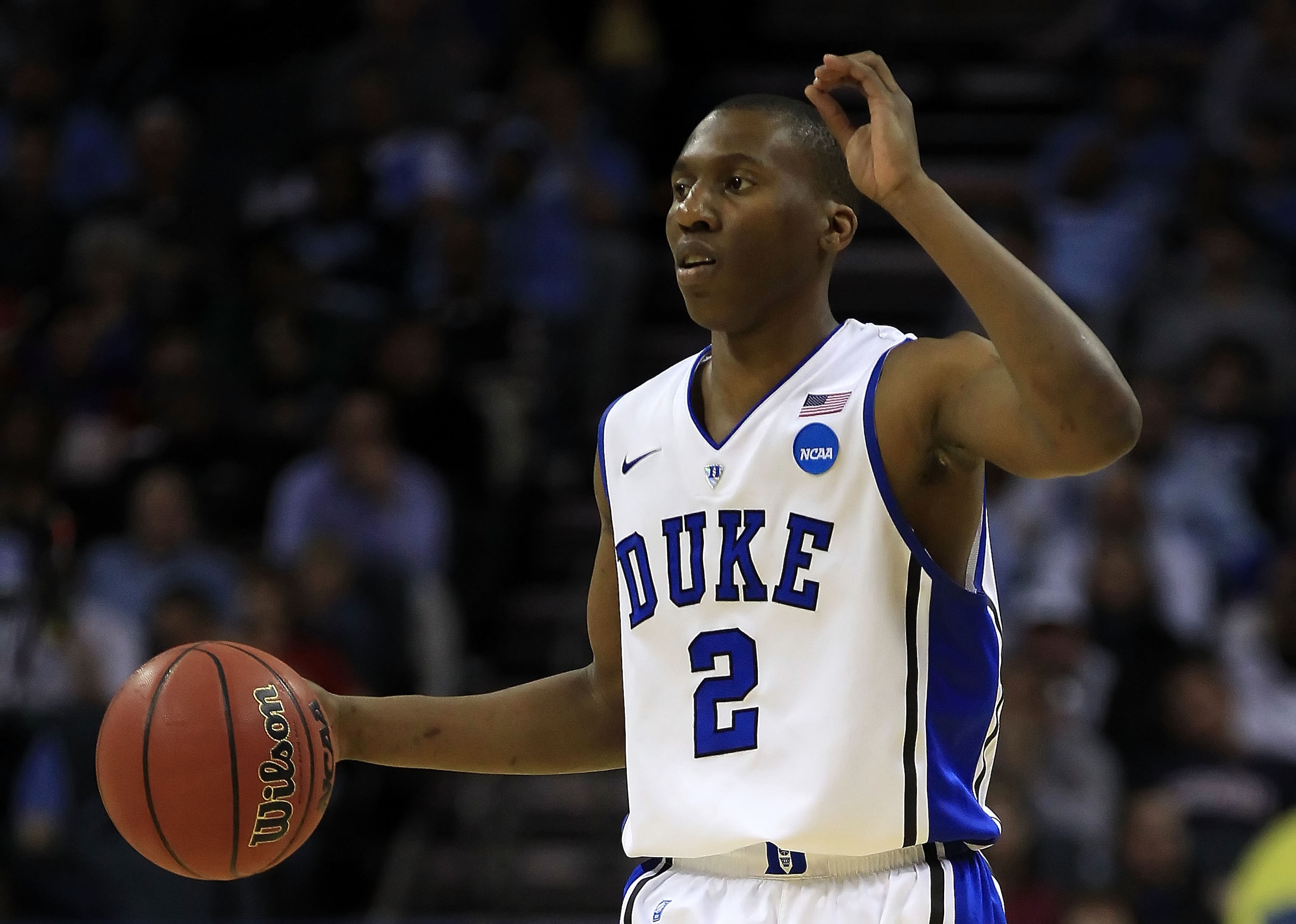 CHARLOTTE, NC - MARCH 20: Nolan Smith #2 of the Duke Blue Devils moves the ball while taking on the Michigan Wolverines during the third round of the 2011 NCAA men's basketball tournament at Time Warner Cable Arena on March 20, 2011 in Charlotte, North C CHARLOTTE, NC - MARCH 20: Nolan Smith #2 of the Duke Blue Devils moves the ball while taking on the Michigan Wolverines during the third round of the 2011 NCAA men's basketball tournament at Time Warner Cable Arena on March 20, 2011 in Charlotte, North C