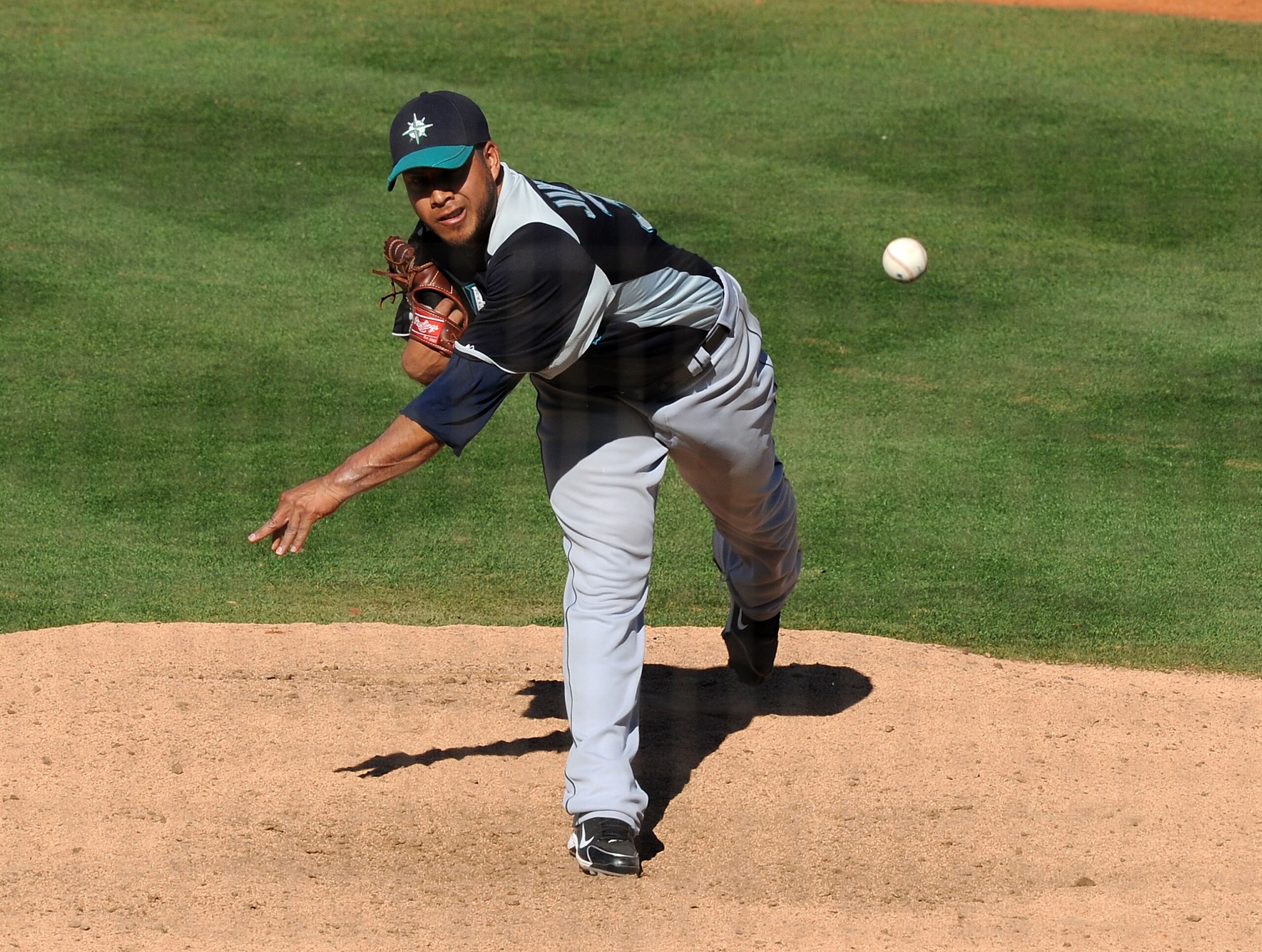 GOODYEAR, AZ - MARCH 11:  Cesar Jimenez #37 of the Seattle Mariners delivers a pitch against the Cleveland Indians at Goodyear Ballpark on March 11, 2011 in Goodyear, Arizona.  (Photo by Norm Hall/Getty Images)