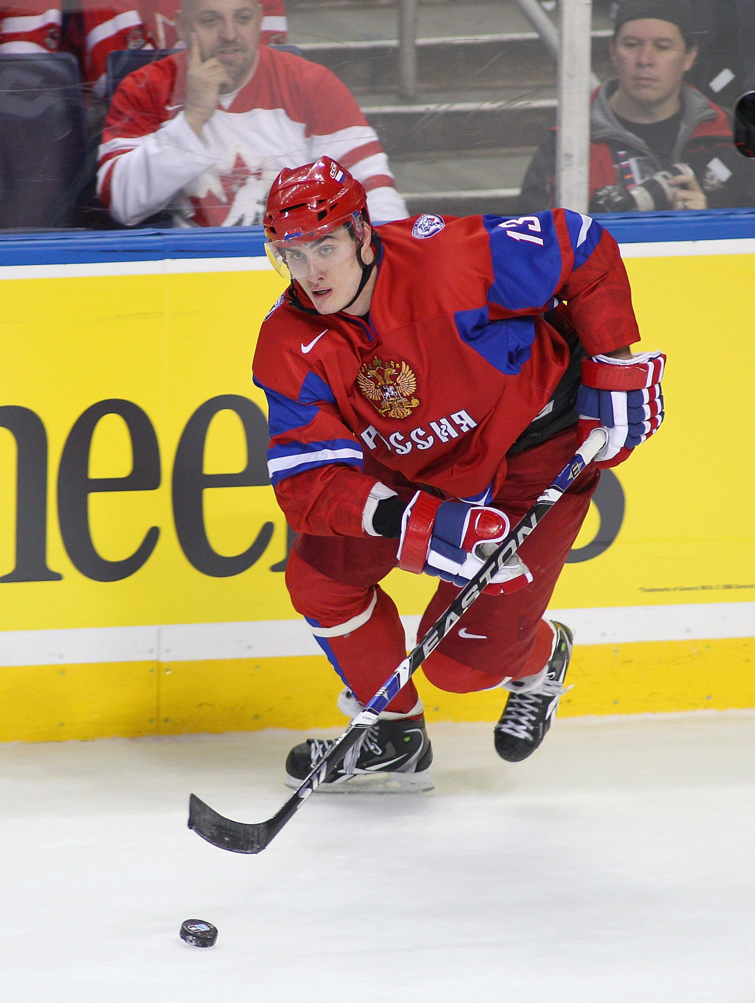 BUFFALO, NY - JANUARY 03: Maxim Kitsyn #13  of Russia skates against  Sweden during the 2011 IIHF World U20 Championship Semi Final game between Sweden and Russia on January 3, 2011 in Buffalo, New York. Russia won 4-3 and faces Canada in the gold medal g