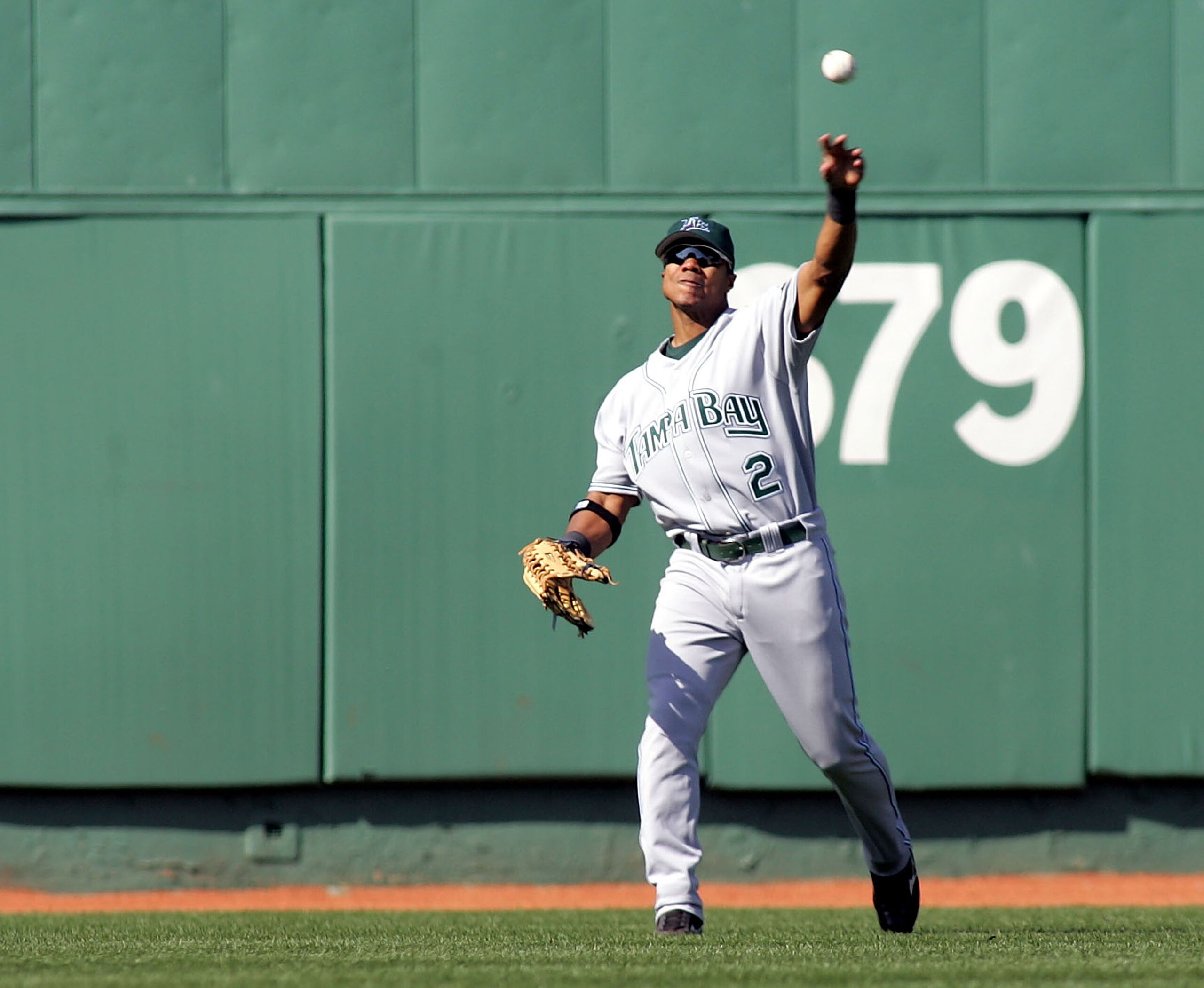 BOSTON - APRIL 17:  Center fielder Alex Sanchez #2 of the Tampa Bay Devil Rays throws the ball back to the infield after making a catch against the Boston Red Sox on April 17, 2005 at Fenway Park in Boston, Massachusetts. The Red Sox won the game 3-1.  (P