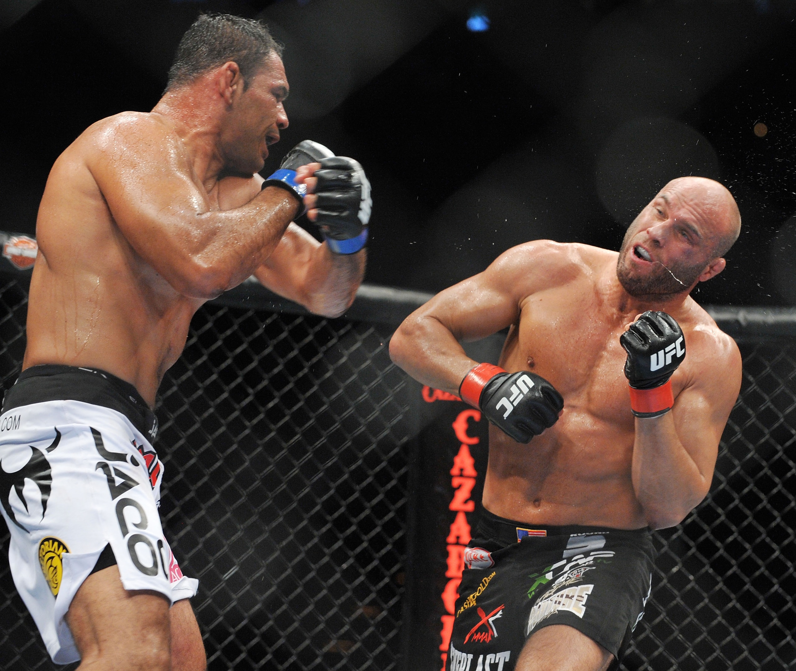 PORTLAND, OR - AUGUST 29:  UFC fighter Antonio Nogueira (L) battles UFC fighter Randy Couture (R) during their Heavyweight bout at UFC 102:  Couture vs. Nogueira at the Rose Garden Arena on August 29, 2009 in Portland, Oregon.  (Photo by Jon Kopaloff/Gett