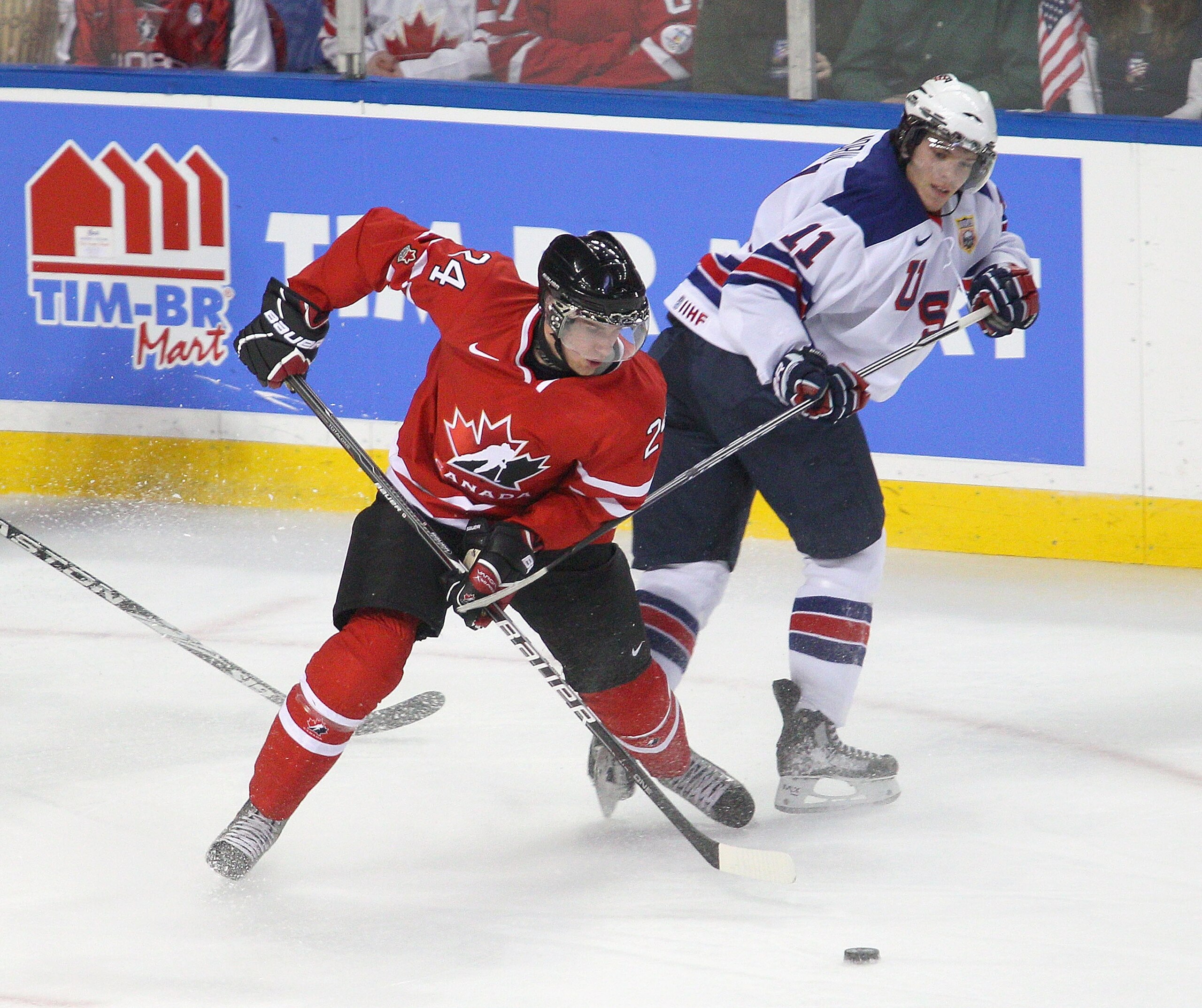 BUFFALO, NY - JANUARY 03:  Calvin de Haan #24 of Canada skates against Jeremy Morin #11 of the United States during the 2011 IIHF World U20 Championship Semi Final game between United States and Canada on January 3, 2011 in Buffalo, New York. Canada won 4