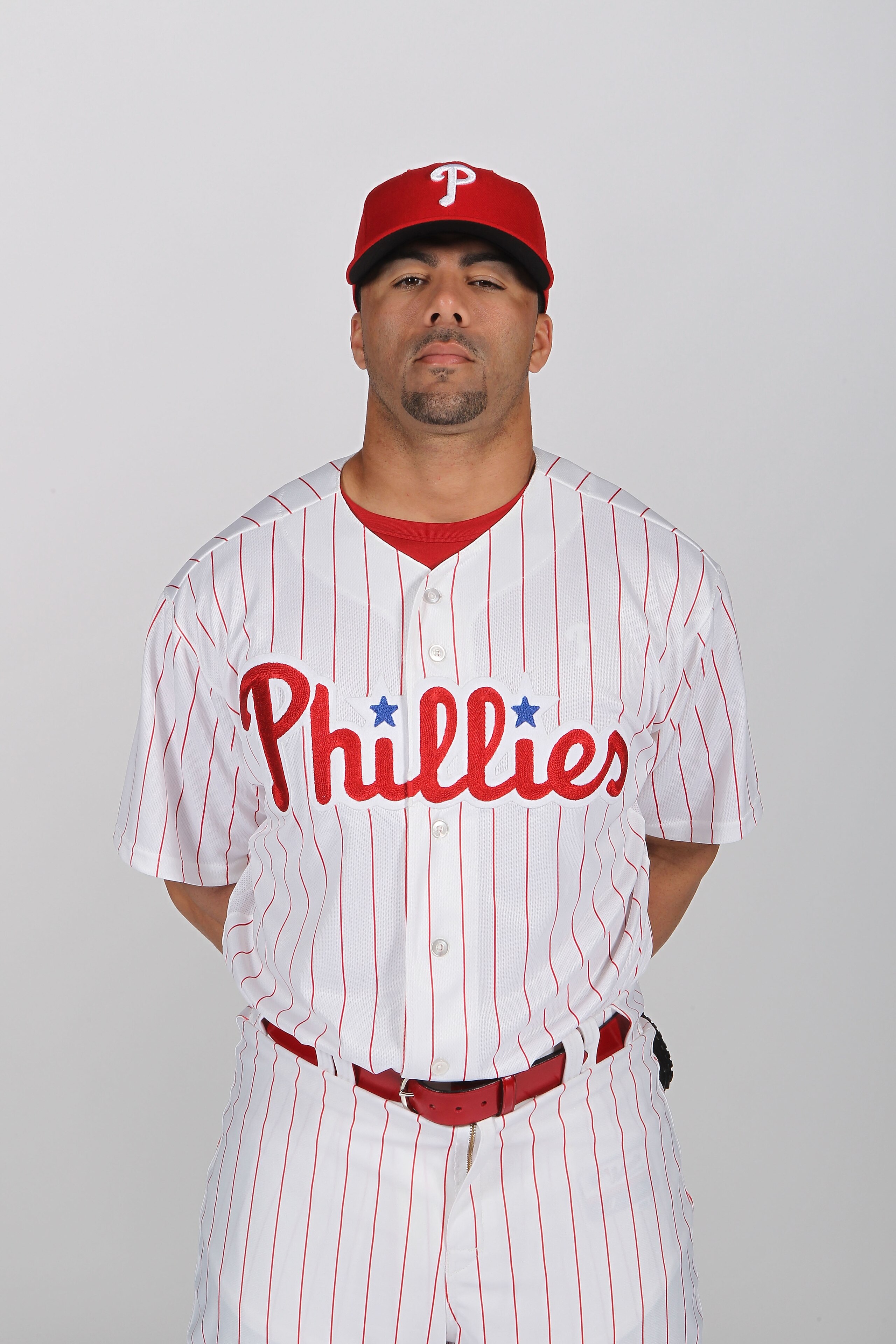 CLEARWATER, FL - FEBRUARY 22:  J.C. Romero #16 of the Philadelphia Phillies poses for a photo during Spring Training Media Photo Day at Bright House Networks Field on February 22, 2011 in Clearwater, Florida.  (Photo by Nick Laham/Getty Images)