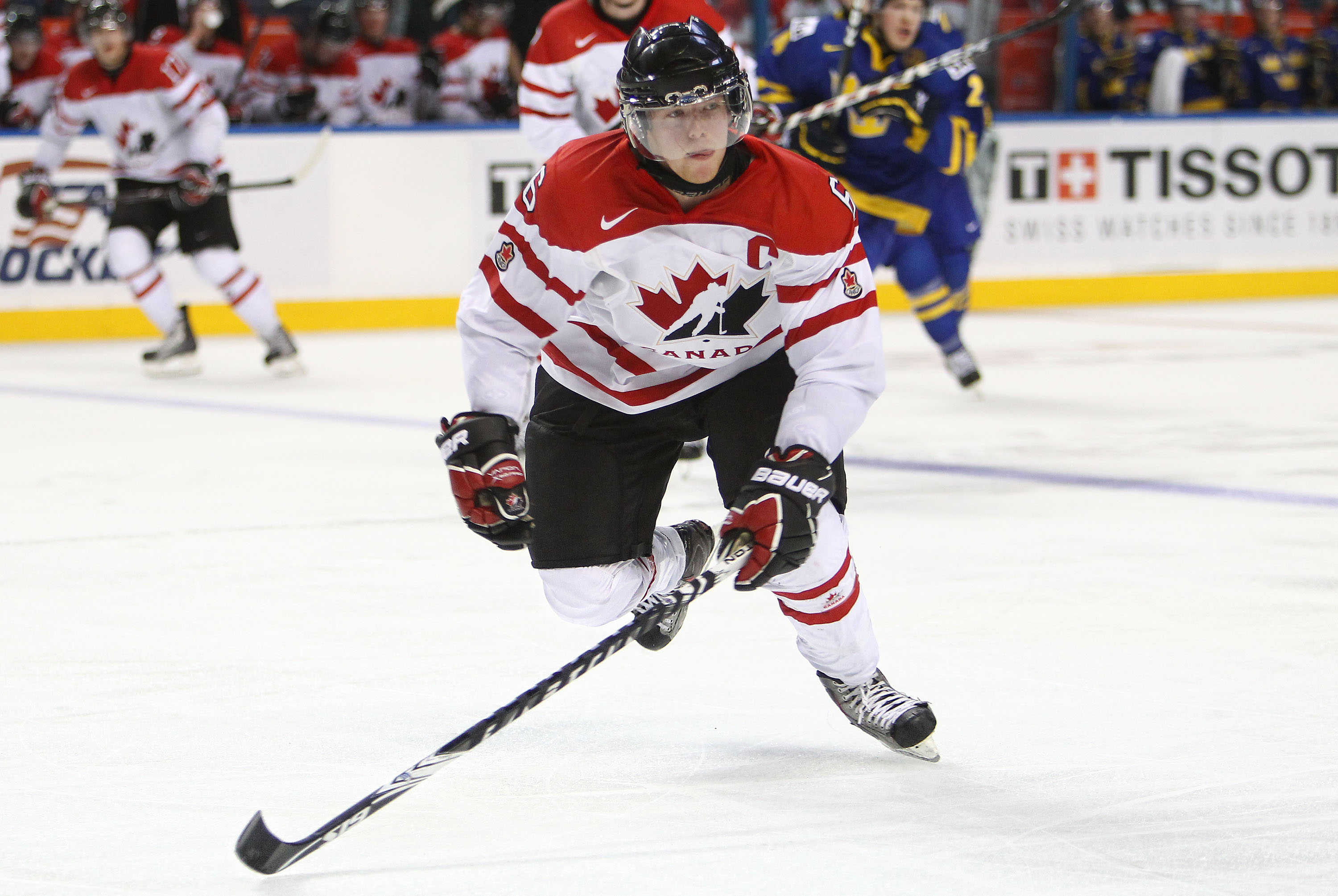 BUFFALO, NY - DECEMBER 31: Defenseman Ryan Ellis #6 of Canada chases the puck during the 2011 IIHF World U20 Championship game between Canada and Sweden on December 31, 2010 at HSBC Arena in Buffalo, New York. (Photo by Tom Szczerbowski/Getty Images)
