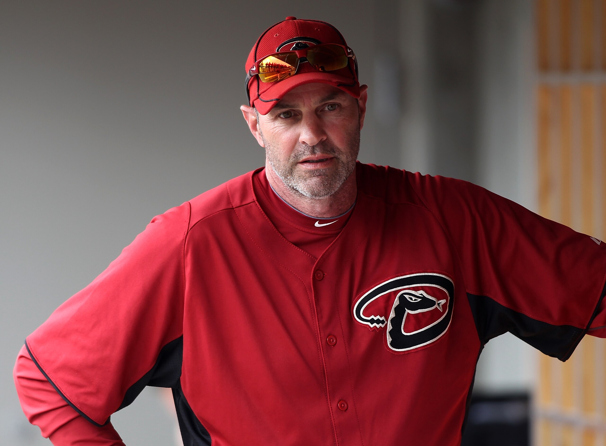 SCOTTSDALE, AZ - FEBRUARY 26:  Manager Kirk Gibson #23 of the Arizona Diamondbacks sits in the dugout during a game against the Colorado Rockies at Salt River Fields on February 26, 2011 in Scottsdale, Arizona..  (Photo by Jonathan Ferrey/Getty Images)