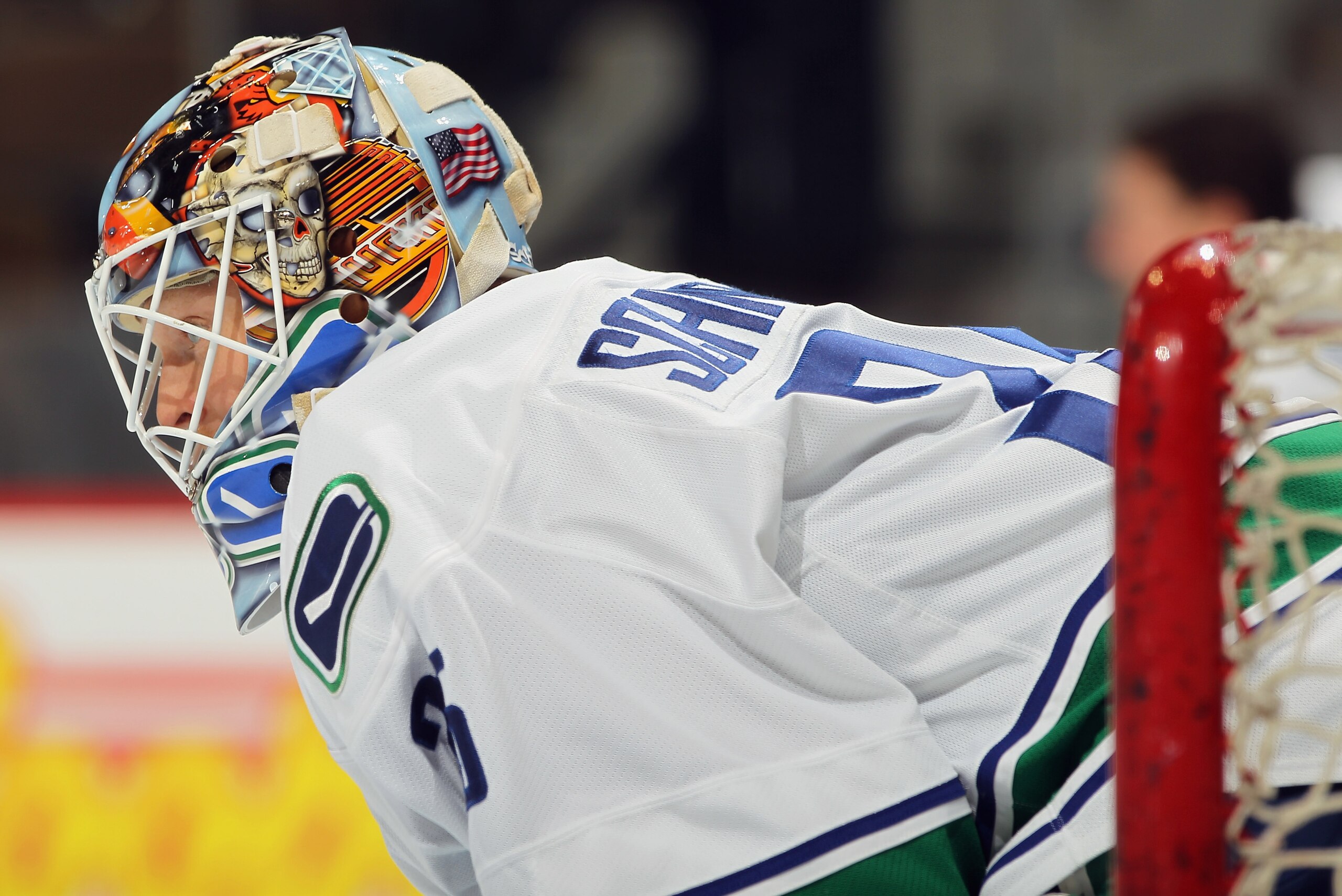 DENVER, CO - JANUARY 18:  Goalie Cory Schneider #35 of the Canucks looks on during warm up prior to facing the Colorado Avalanche at the Pepsi Center on January 18, 2011 in Denver, Colorado. The Avalanche defeated the Canucks 4-3 in overtime.  (Photo by D