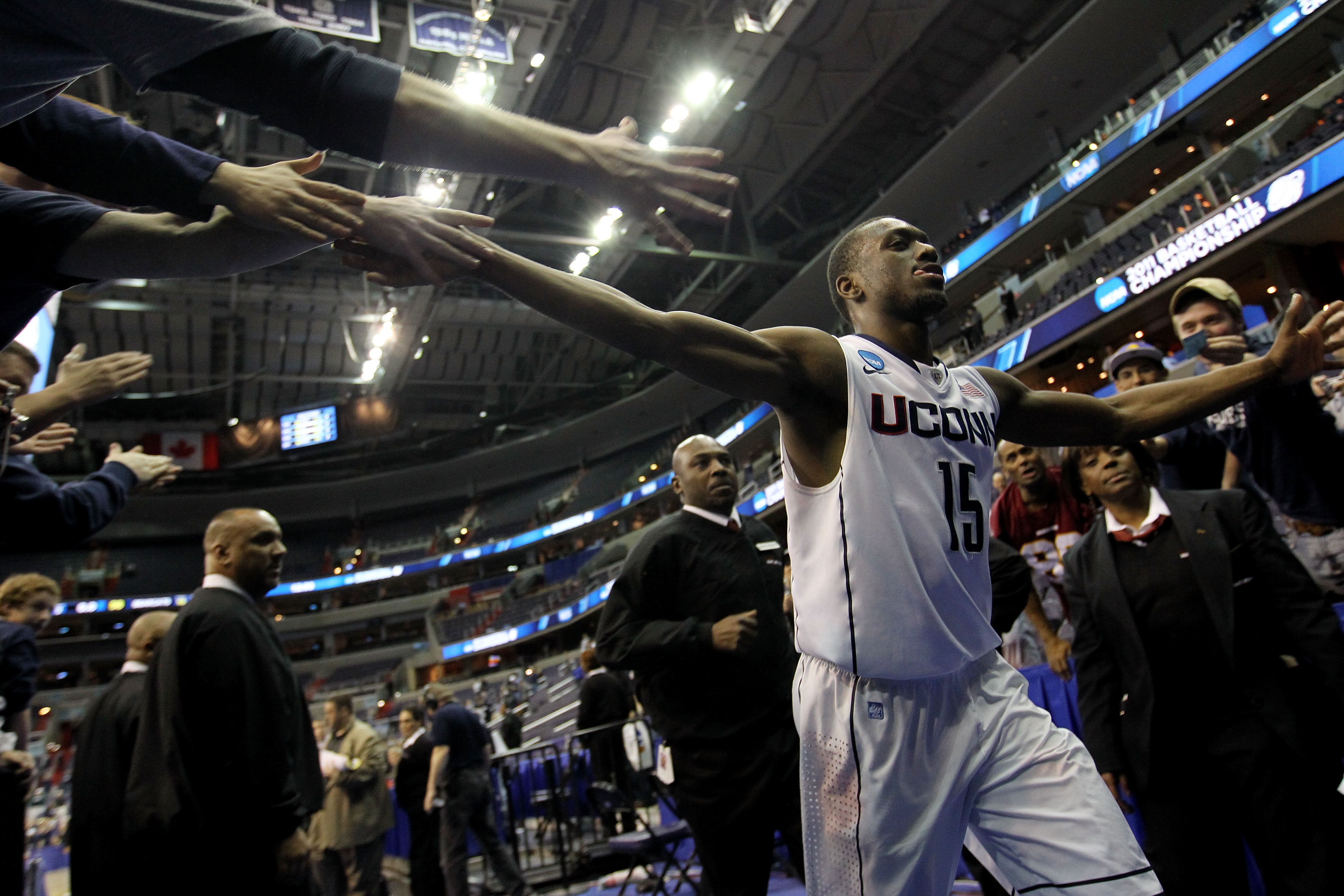 WASHINGTON - MARCH 19:  Kemba Walker #15 of the Connecticut Huskies celebrates their 69-58 win over the Cincinnati Bearcats during the third round of the 2011 NCAA men's basketball tournament at Verizon Center on March 19, 2011 in Washington, DC.  (Photo