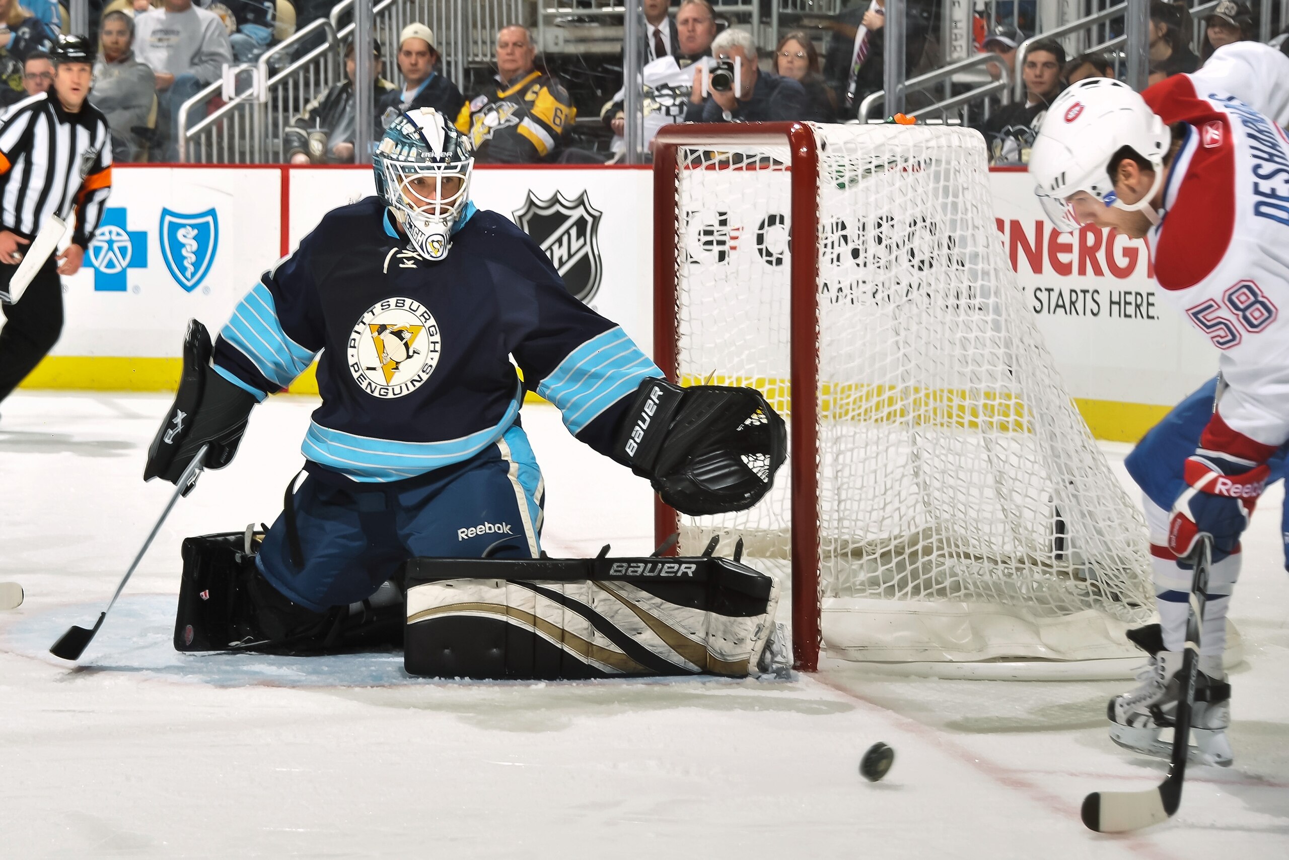 PITTSBURGH, PA - MARCH 12:  Goaltender Brent Johnson #1 of the Pittsburgh Penguins prepares to make a save on a shot from David Desharnais #58 of the Montreal Canadiens on March 12, 2011 at CONSOL Energy Center in Pittsburgh, Pennsylvania.  (Photo by Jami