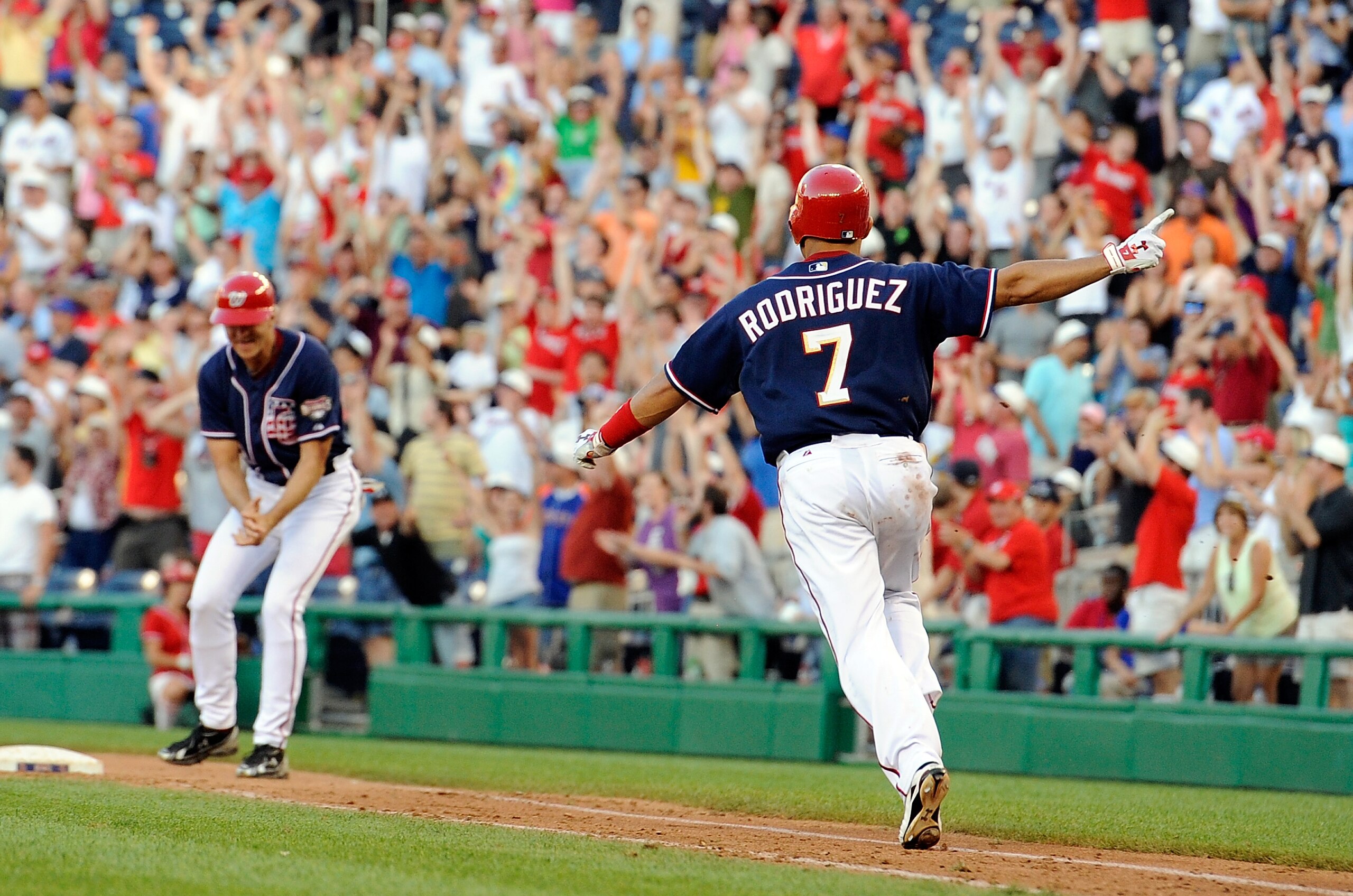 WASHINGTON - JULY 03: Ivan Rodriguez #7 of the Washington Nationals celebrates after driving in the game winning run in the ninth inning against the New York Mets at Nationals Park on July 3, 2010 in Washington, DC. The Nationals won the game 6-5. (Phot WASHINGTON - JULY 03: Ivan Rodriguez #7 of the Washington Nationals celebrates after driving in the game winning run in the ninth inning against the New York Mets at Nationals Park on July 3, 2010 in Washington, DC. The Nationals won the game 6-5. (Phot