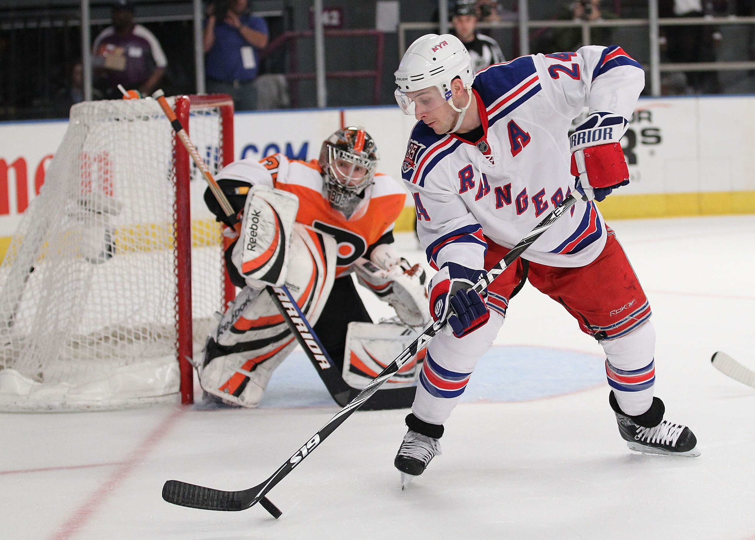 NEW YORK - MARCH 6:  Ryan Callahan #24 of the New York Rangers shoots the puck against Sergei Bobrovsky #35 of the Philadelphia Flyers during their game on March 6, 2011 at Madison Square Garden in New York City, New York.  (Photo by Al Bello/Getty Images