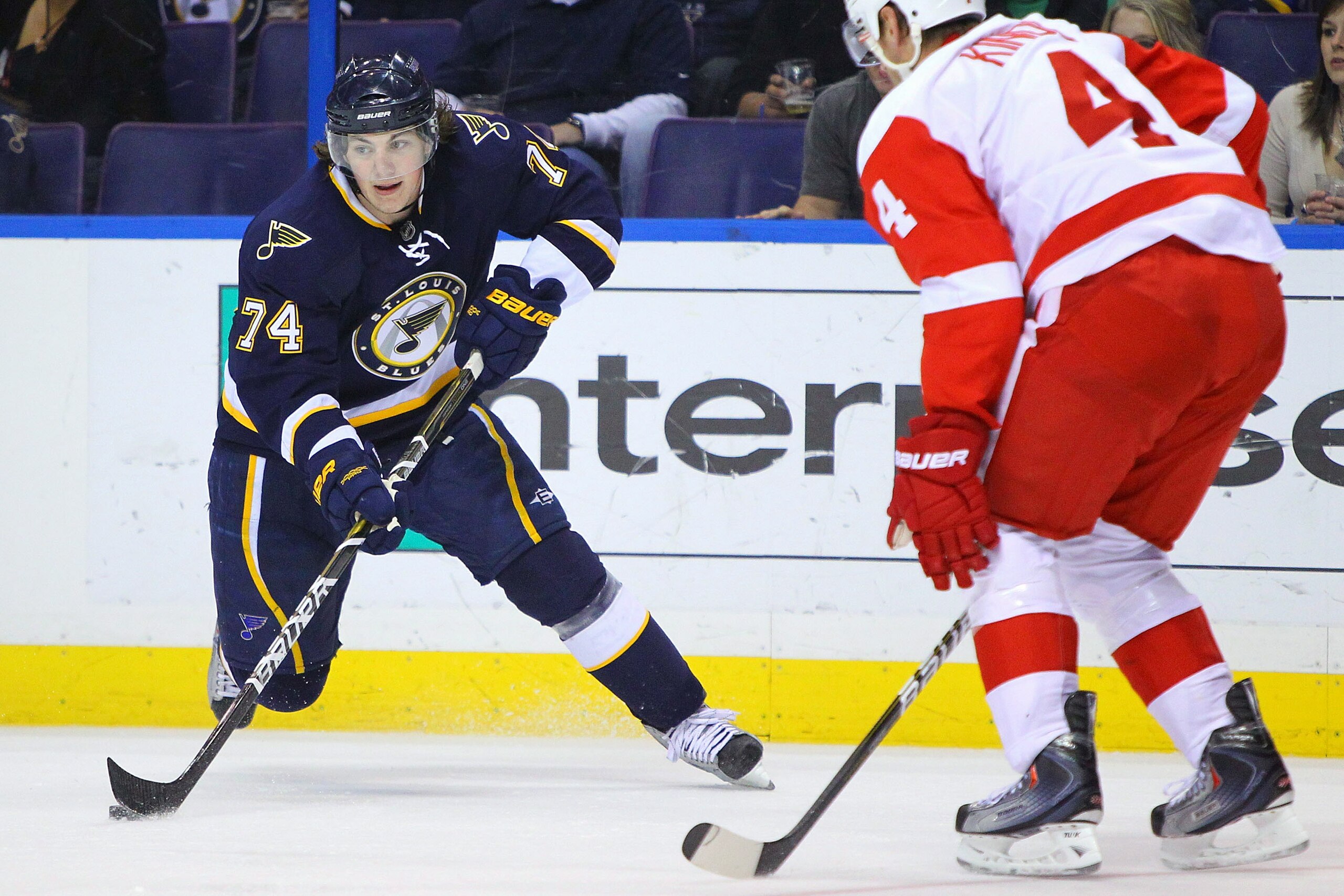 ST. LOUIS, MO - MARCH 12: T.J. Oshie #74 of the St. Louis Blues looks to pass the puck against the Detroit Red Wings at the Scottrade Center on March 12, 2011 in St. Louis, Missouri.  (Photo by Dilip Vishwanat/Getty Images)