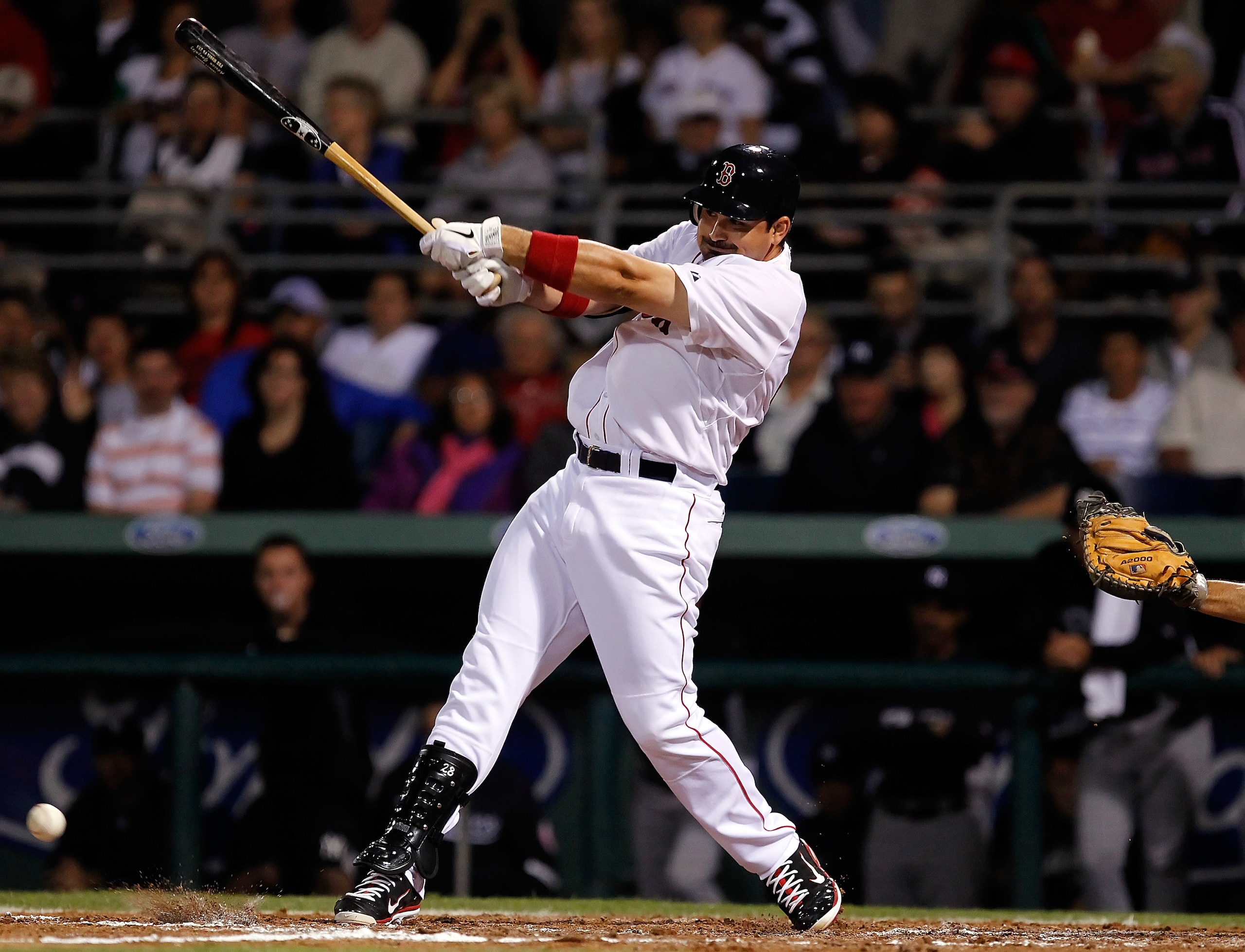 FORT MYERS, FL - MARCH 14: Infielder Adrian Gonzalez #28 of the Boston Red Sox bats against the New York Yankees during a Grapefruit League Spring Training Game at City of Palms Park on March 14, 2011 in Fort Myers, Florida. (Photo by J. Meric/Getty Ima FORT MYERS, FL - MARCH 14: Infielder Adrian Gonzalez #28 of the Boston Red Sox bats against the New York Yankees during a Grapefruit League Spring Training Game at City of Palms Park on March 14, 2011 in Fort Myers, Florida. (Photo by J. Meric/Getty Ima