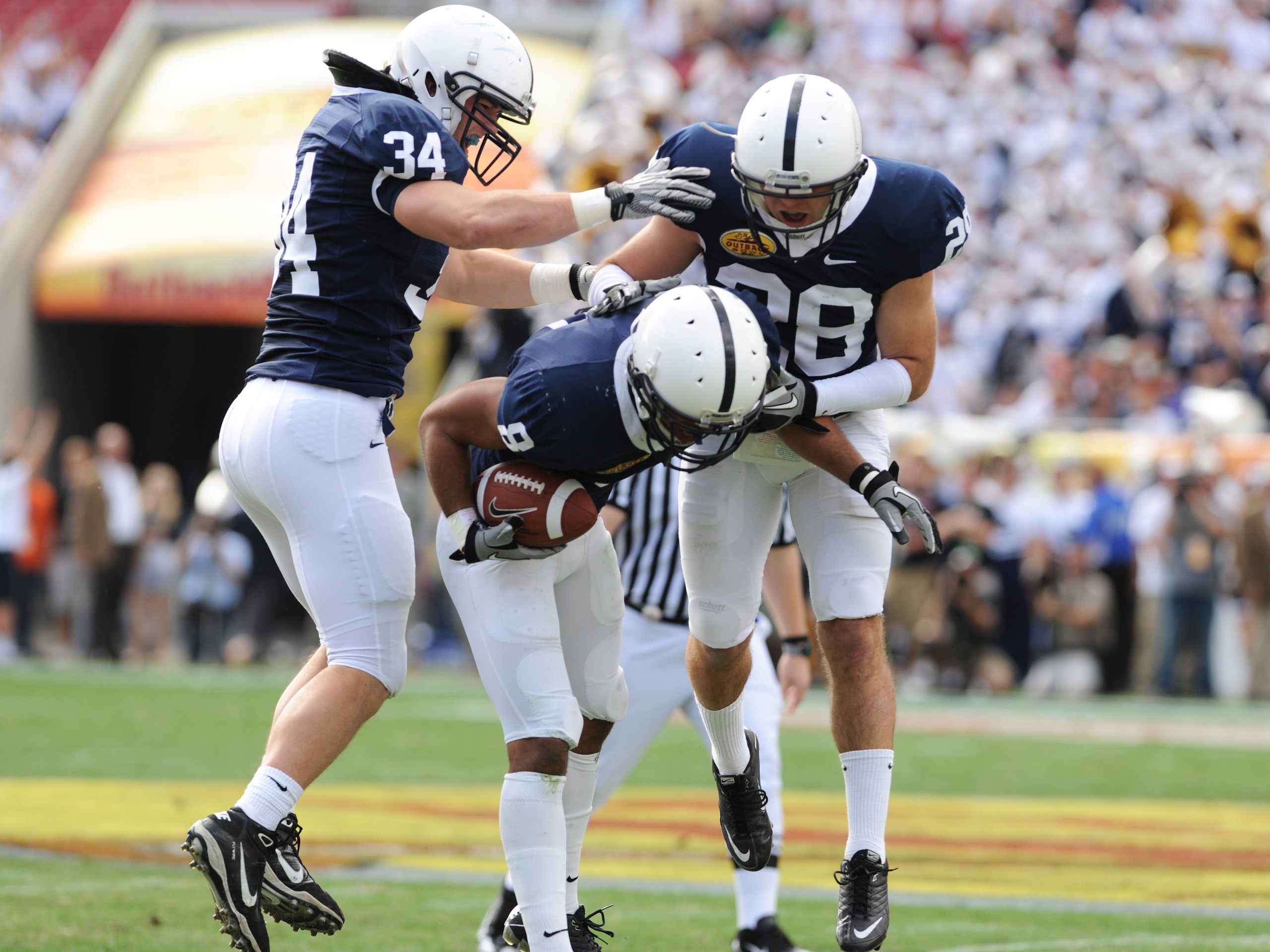 TAMPA, FL - JANUARY 1:  Cornerback D'Anton Lynn #8 of the Penn State Nittany Lions intercepts a first-quarter pass against the Florida Gators January 1, 2011 in the 25th Outback Bowl at Raymond James Stadium in Tampa, Florida.  (Photo by Al Messerschmidt/