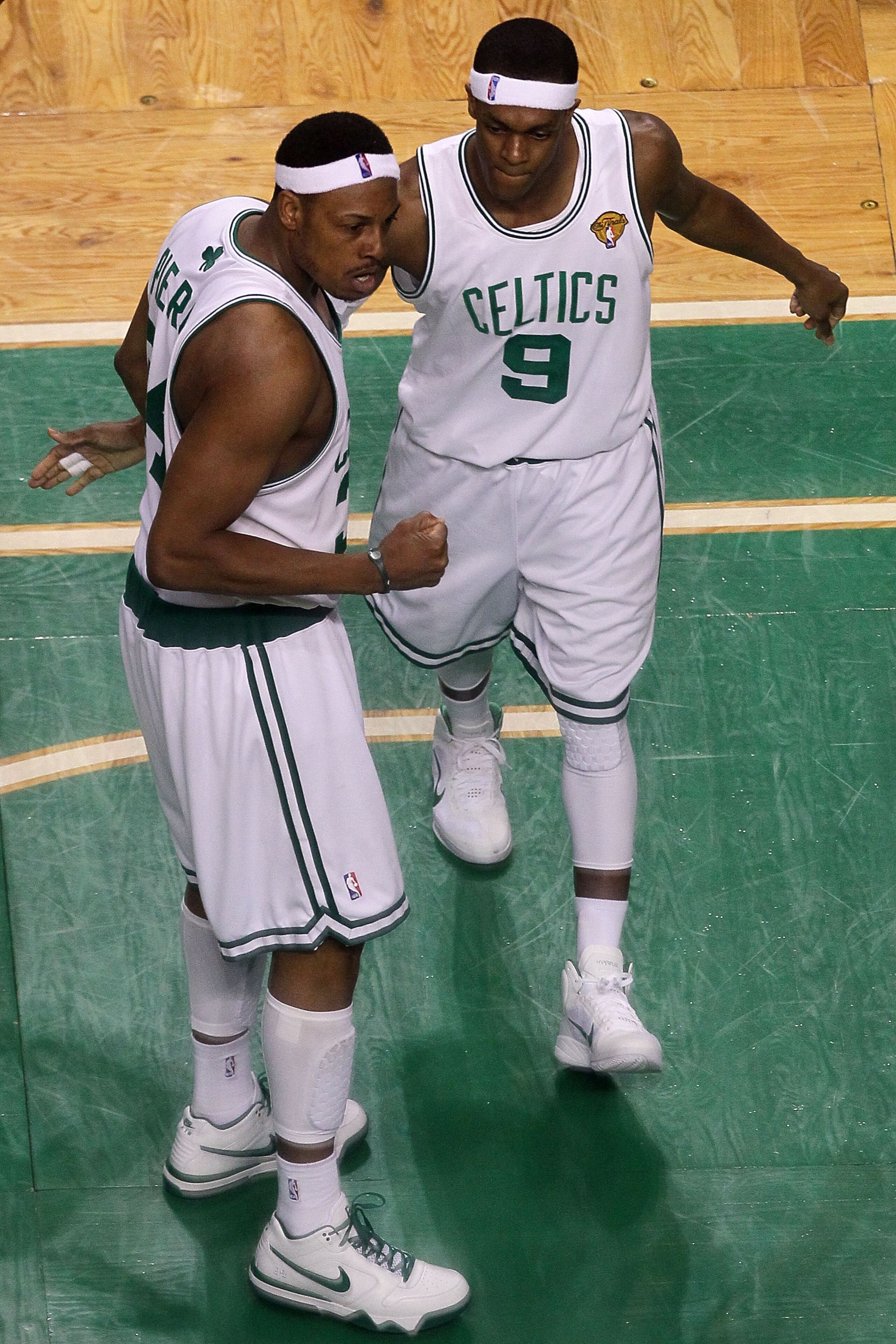 BOSTON - JUNE 10:  Paul Pierce #34 and Rajon Rondo #9 of the Boston Celtics celebrate in the Celtics' win over the Los Angeles Lakers during Game Four of the 2010 NBA Finals on June 10, 2010 at TD Garden in Boston, Massachusetts. NOTE TO USER: User expres