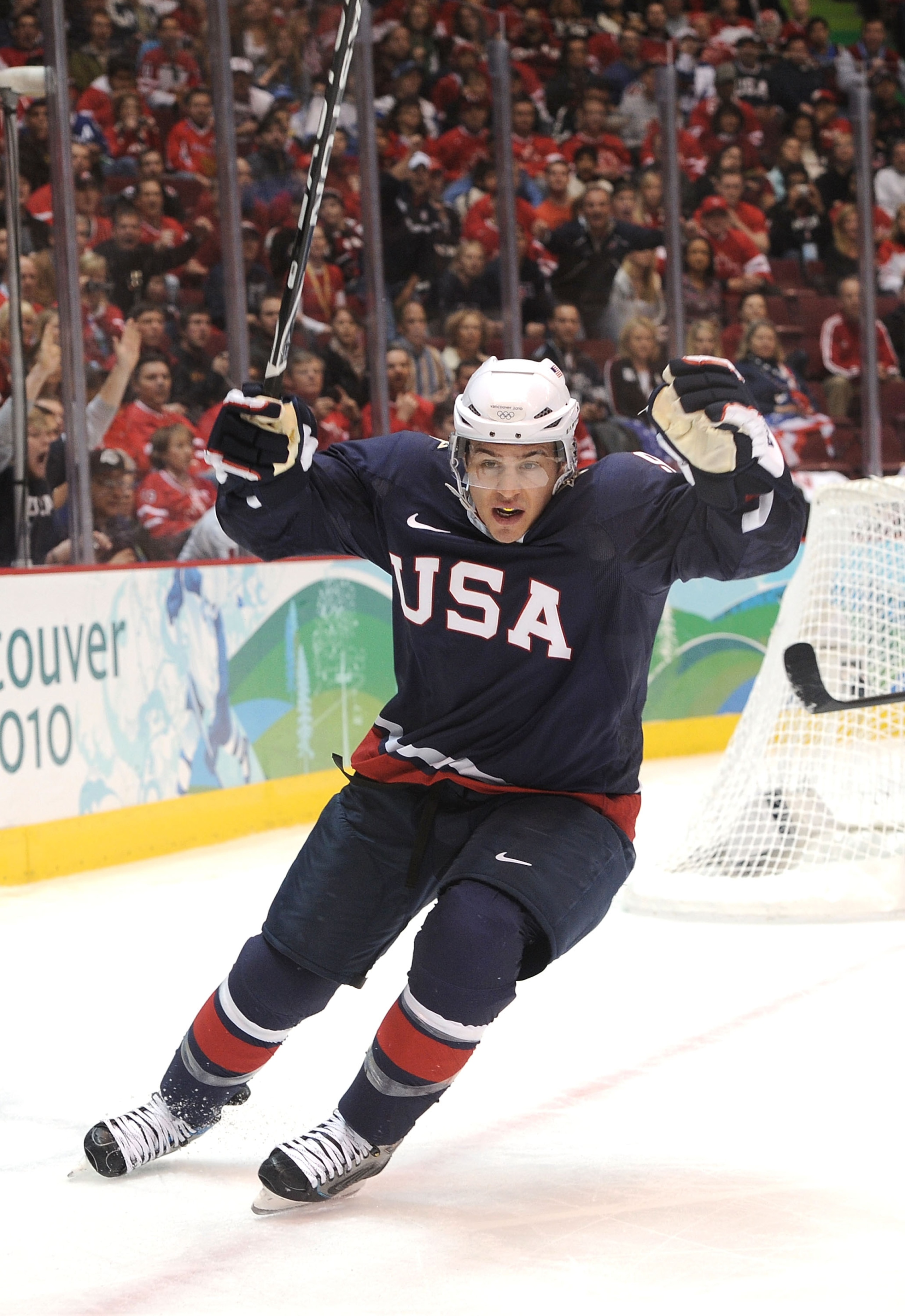 VANCOUVER, BC - FEBRUARY 26:  Zach Parise #9 of the United States celebrating scoring past goalkeeper Miikka Kiprusoff #34 of Finland during the ice hockey men's semifinal game between the United States and Finland on day 15 of the Vancouver 2010 Winter O