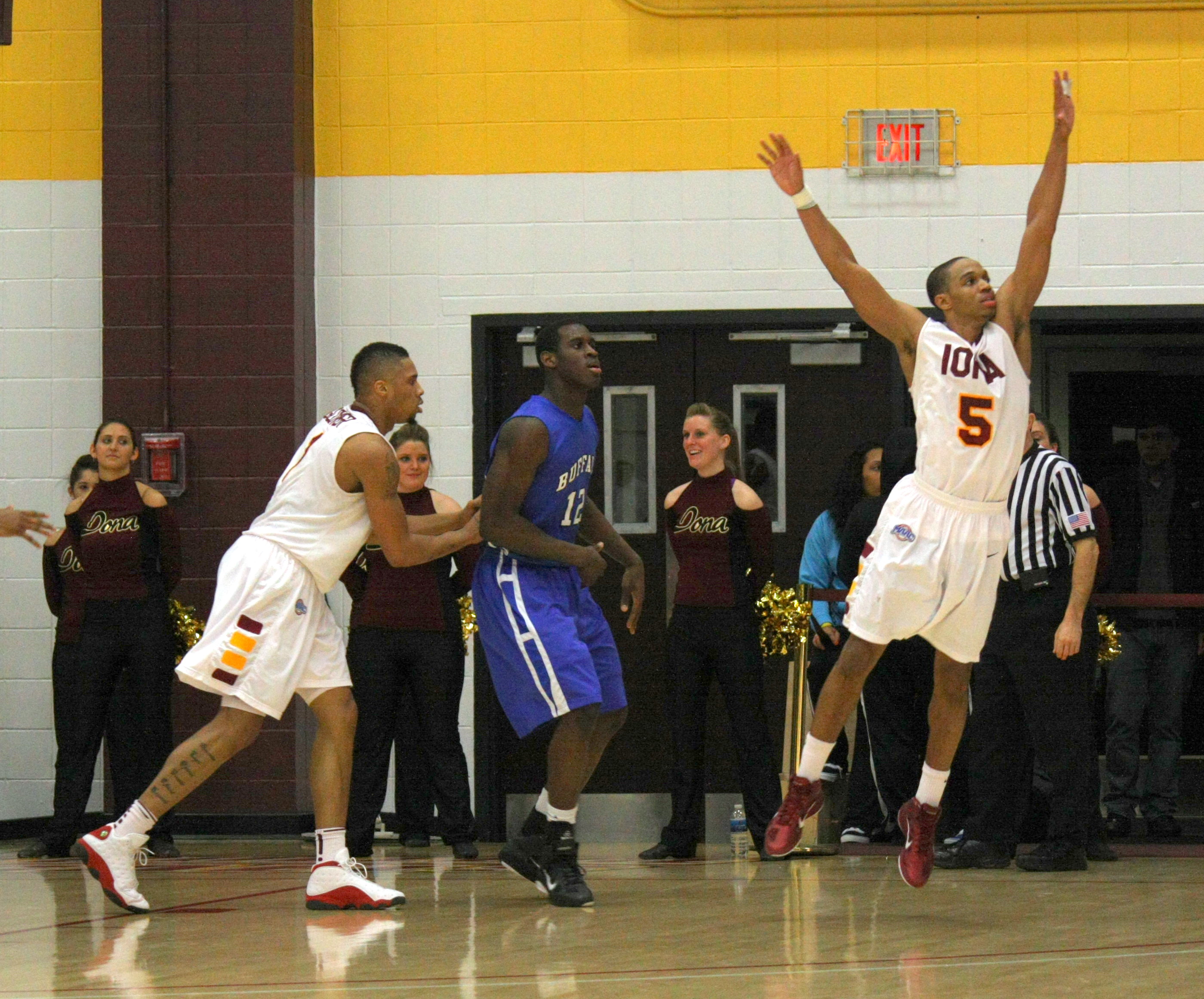 Mike Glover guards Javon McCrea who had 27 points for Buffalo