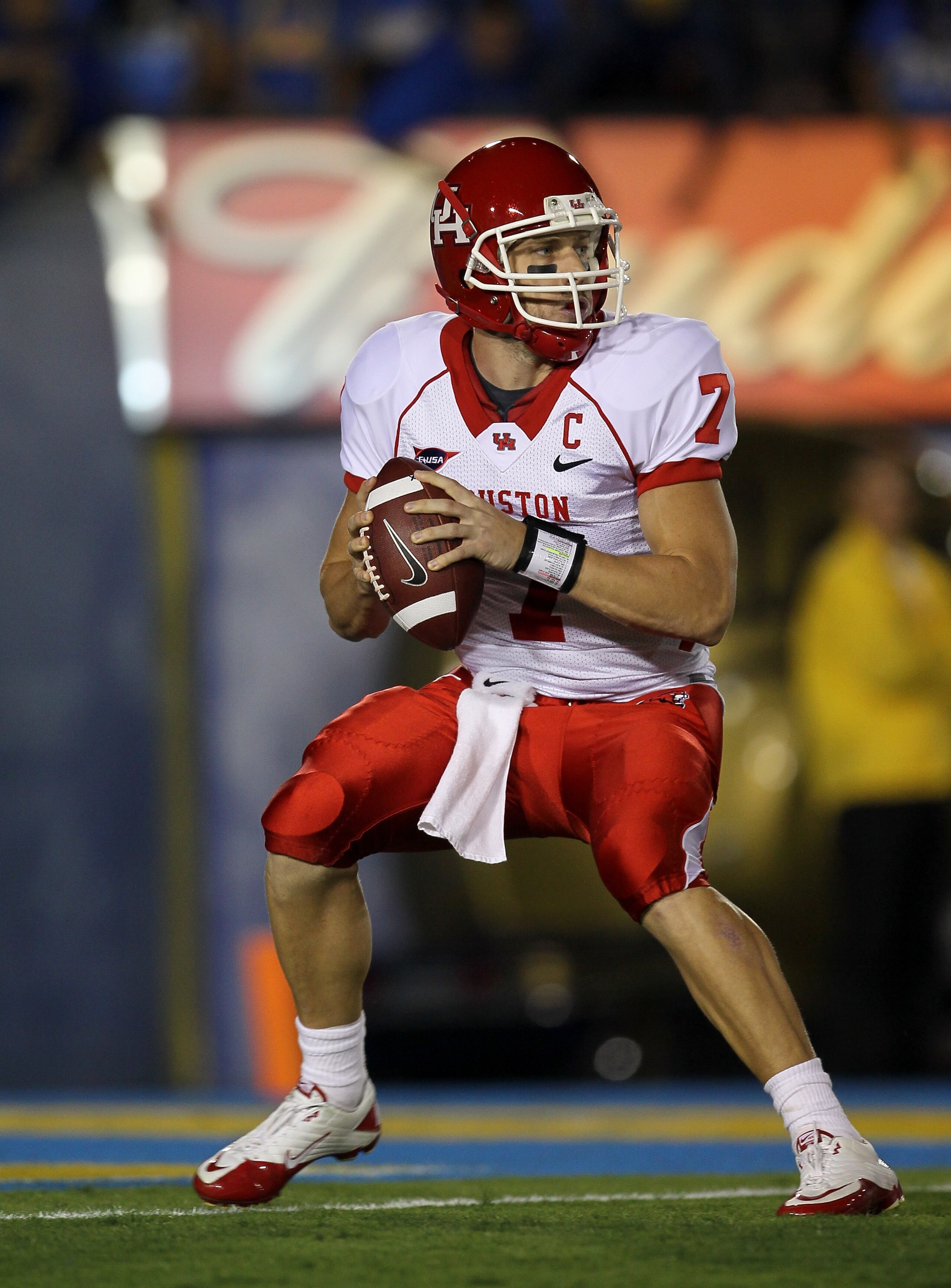 PASADENA, CA - SEPTEMBER 18: Quarterback Case Keenum #7 of the Houston Cougars drops back to pass against the UCLA Bruins in the second quarter at the Rose Bowl on September 18, 2010 in Pasadena, California. UCLA won 31-13. (Photo by Stephen Dunn/Getty PASADENA, CA - SEPTEMBER 18: Quarterback Case Keenum #7 of the Houston Cougars drops back to pass against the UCLA Bruins in the second quarter at the Rose Bowl on September 18, 2010 in Pasadena, California. UCLA won 31-13. (Photo by Stephen Dunn/Getty