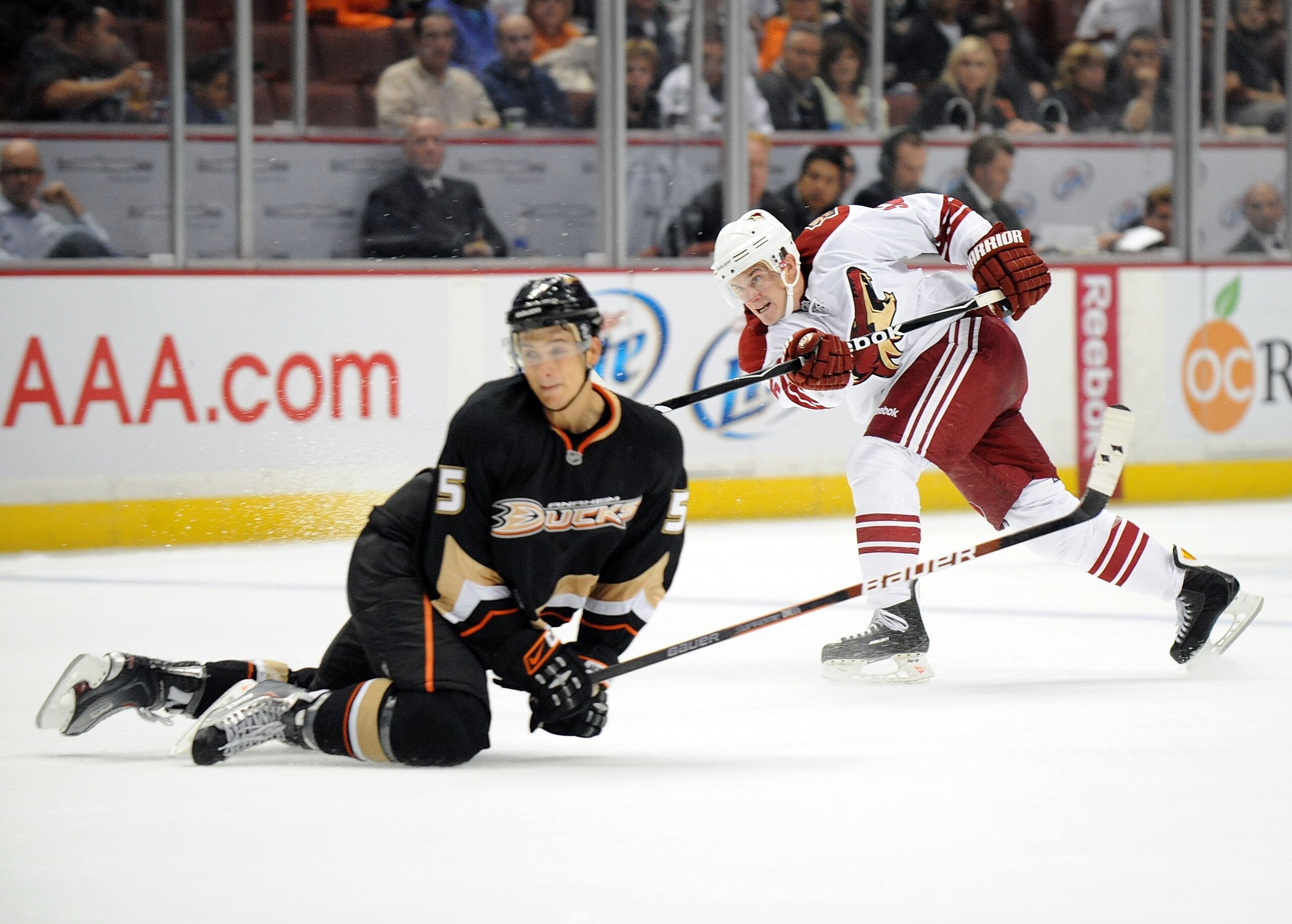 ANAHEIM, CA - SEPTEMBER 16:  Chad Kolarik #52 of the Phoenix Coyotes shoots as Luca Sbisa #5 attempts a block during the game at Honda Center on September 16, 2009 in Anaheim, California.  (Photo by Harry How/Getty Images)