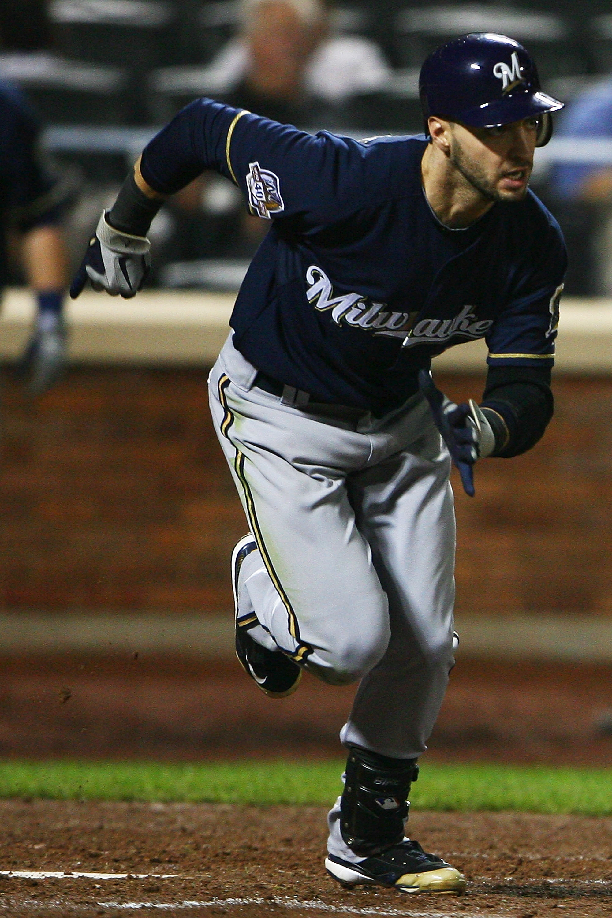 NEW YORK - SEPTEMBER 30: Ryan Braun #8 of the Milwaukee Brewers runs after hitting a one run single in the ninth inning against the New York Mets on September 30, 2010 at Citi Field in the Flushing neighborhood of the Queens borough of New York City. The