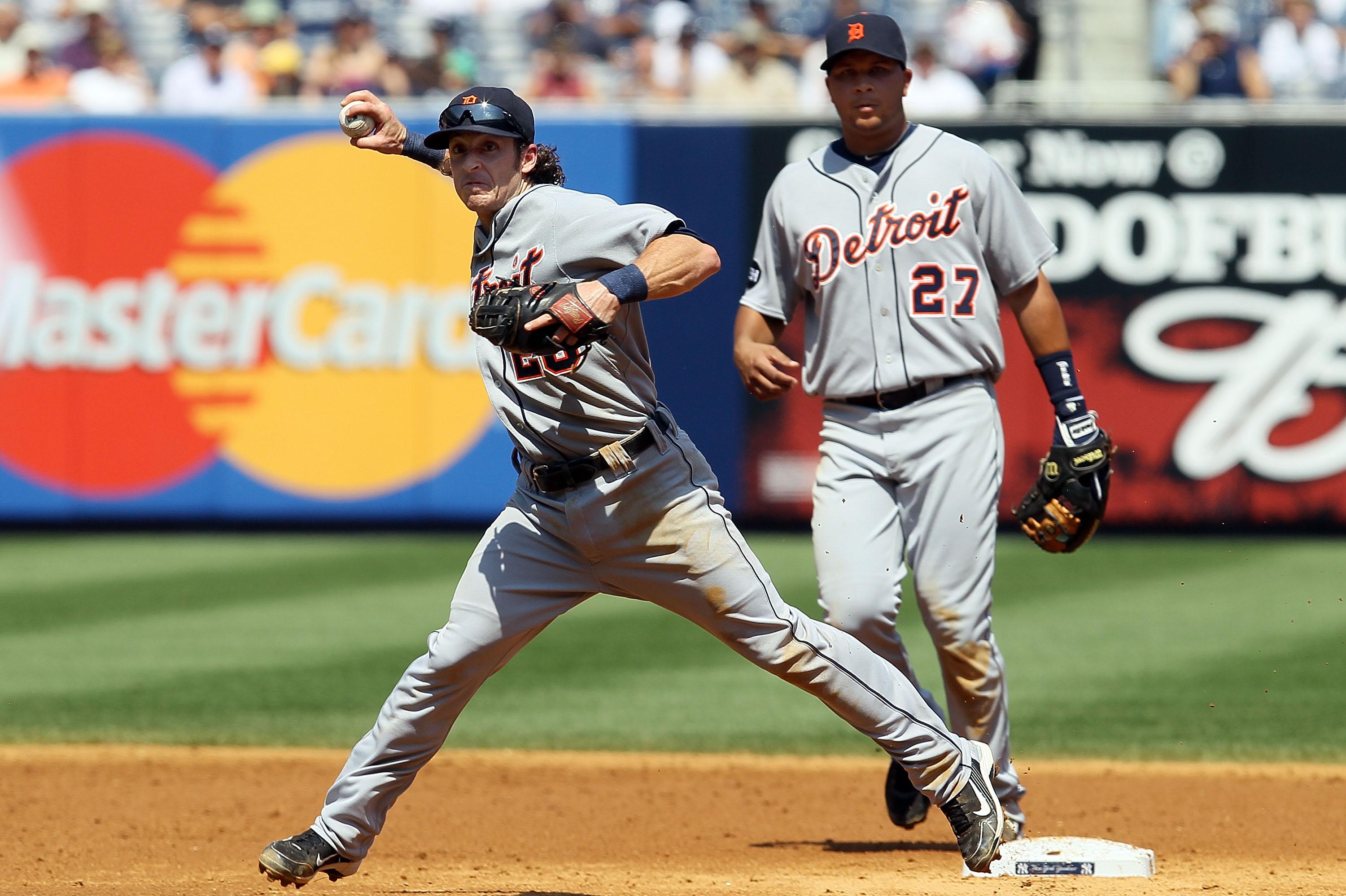 NEW YORK - AUGUST 19:  Will Rhymes #28 of the Detroit Tigers throws to first base for an out against the New York Yankees on August 19, 2010 at Yankee Stadium in the Bronx borough of New York City.  (Photo by Jim McIsaac/Getty Images)