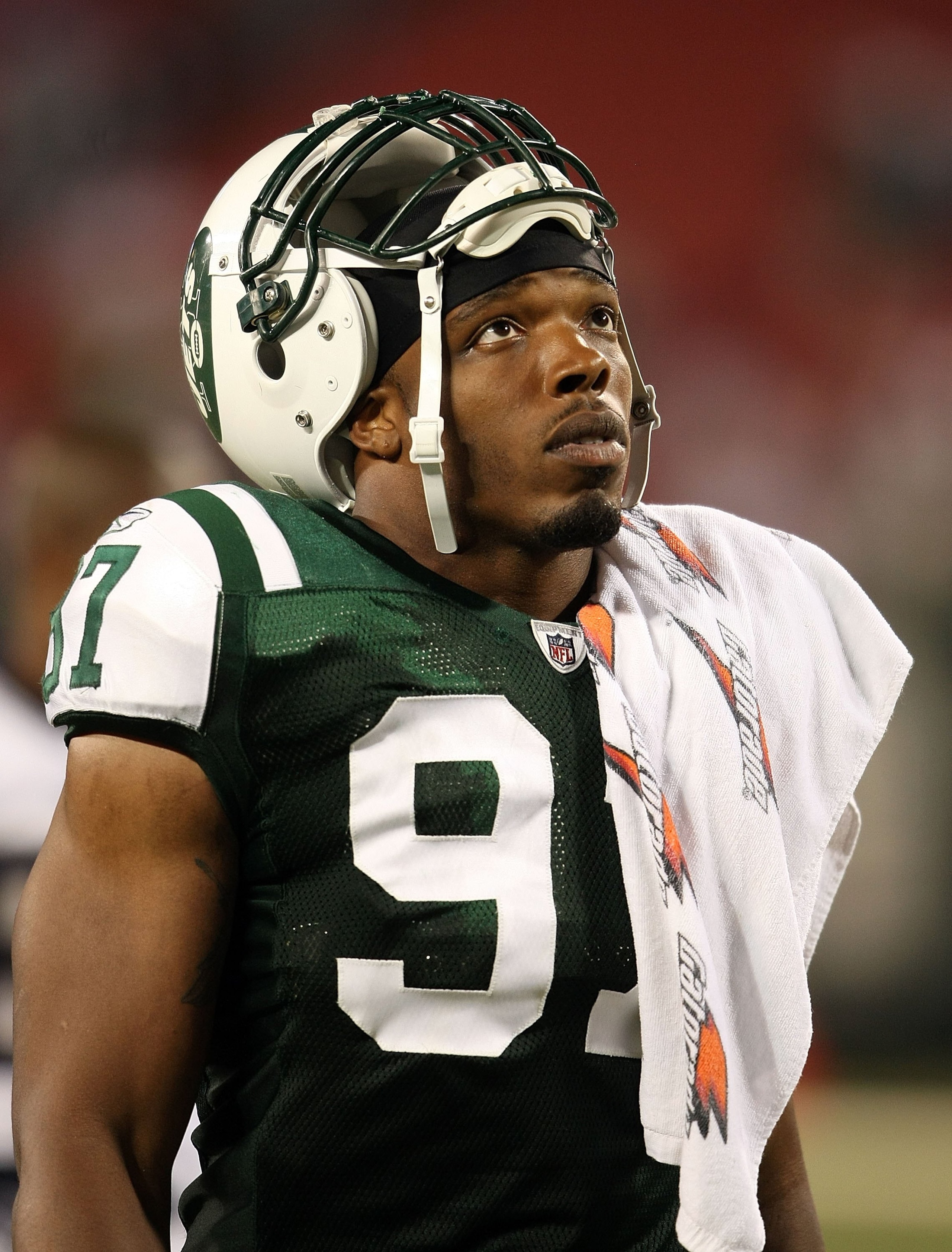 EAST RUTHERFORD, NJ - AUGUST 14: Calvin Pace #97 of the New York Jets walks off the field against the St. Louis Rams during their preseason game at Giants Stadium on August 14, 2009  in East Rutherford, New Jersey.  (Photo by Nick Laham/Getty Images)