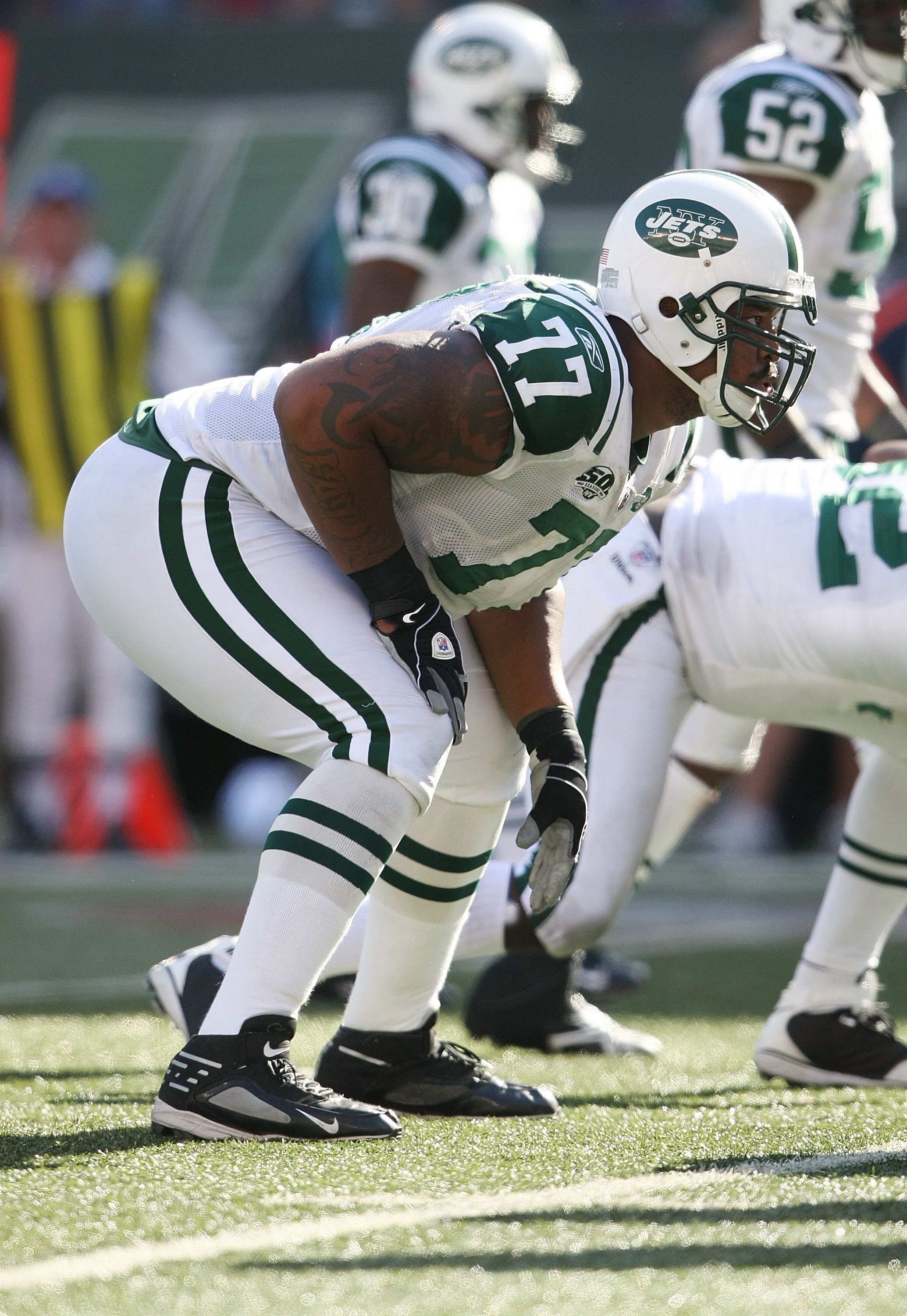 EAST RUTHERFORD, NJ - SEPTEMBER 20:  Kris Jenkins #77 of the New York Jets waits for the snap against the New England Patriots at Giants Stadium on September 20, 2009 in East Rutherford, New Jersey.  (Photo by Nick Laham/Getty Images)